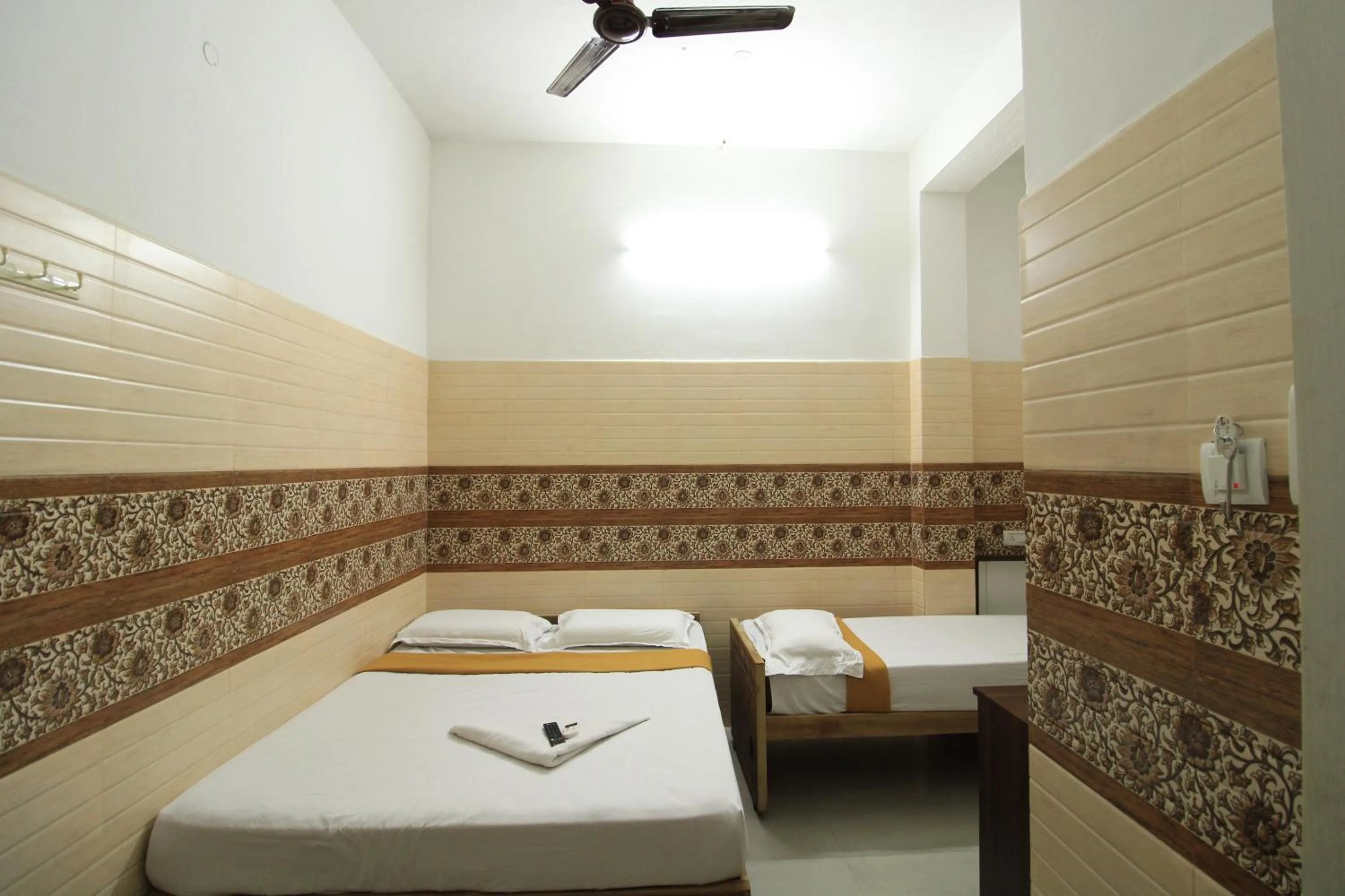 Bed in Just Guest House, Chennai Airport