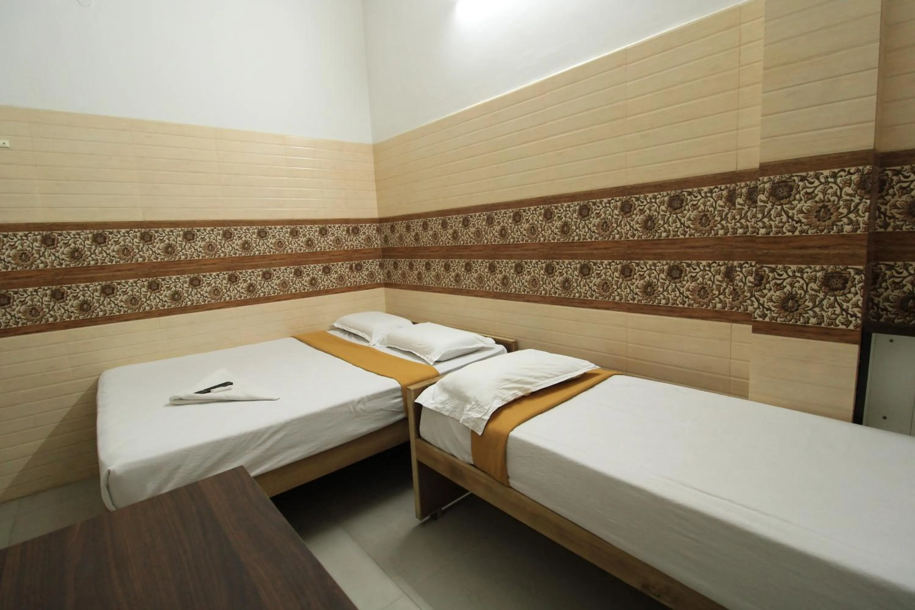Bed in Just Guest House, Chennai Airport