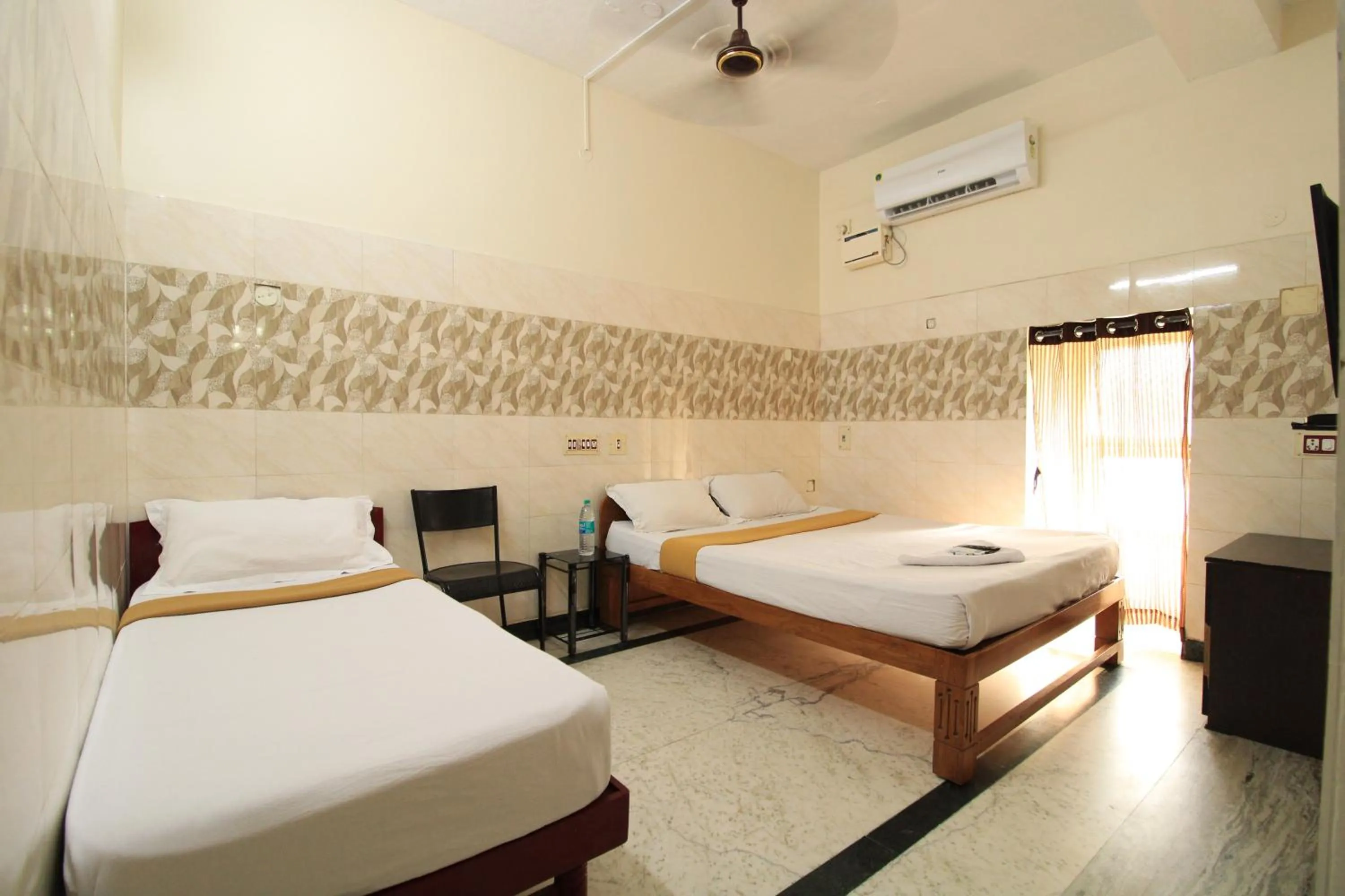 Bed in Just Guest House, Chennai Airport