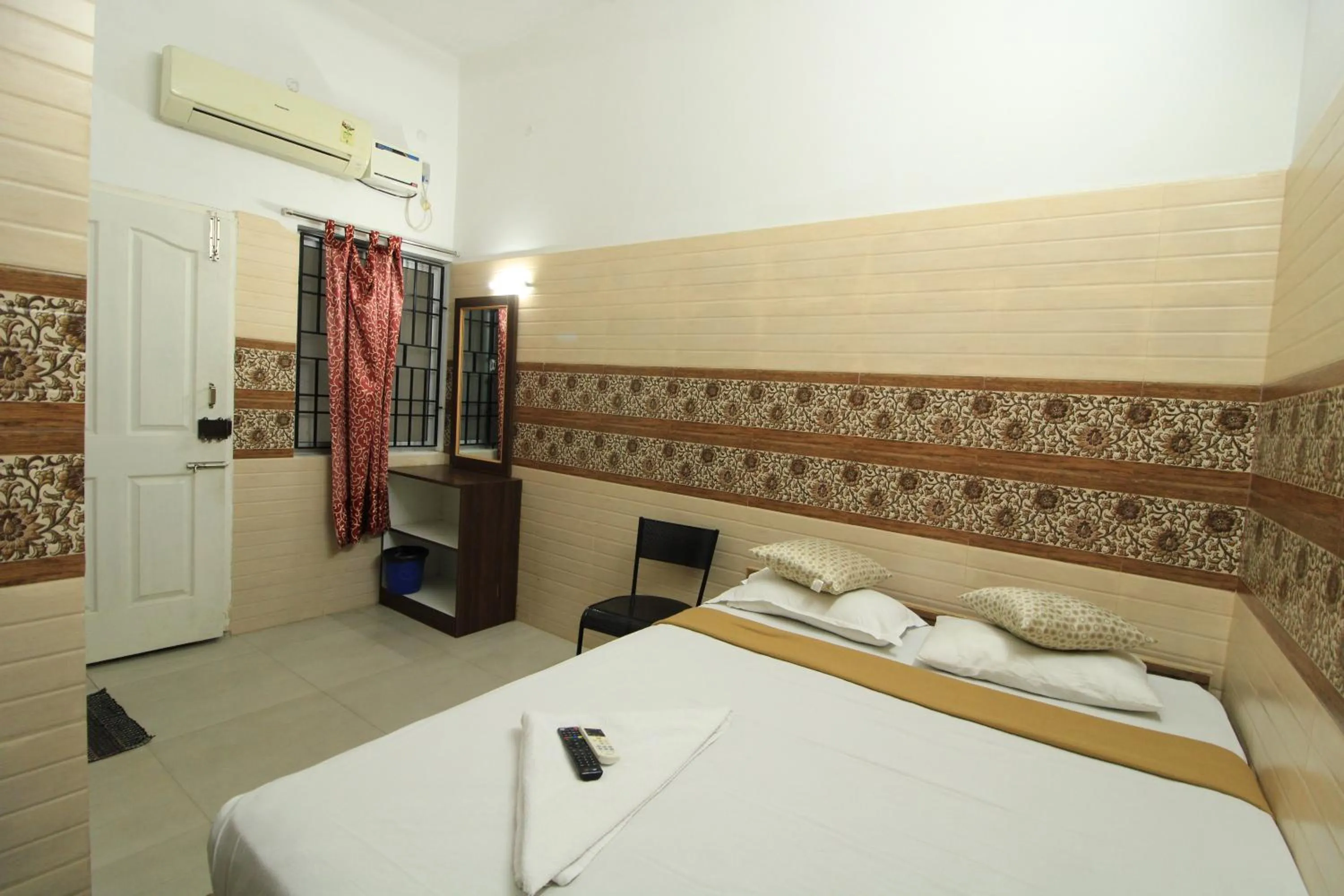 Bed in Just Guest House, Chennai Airport