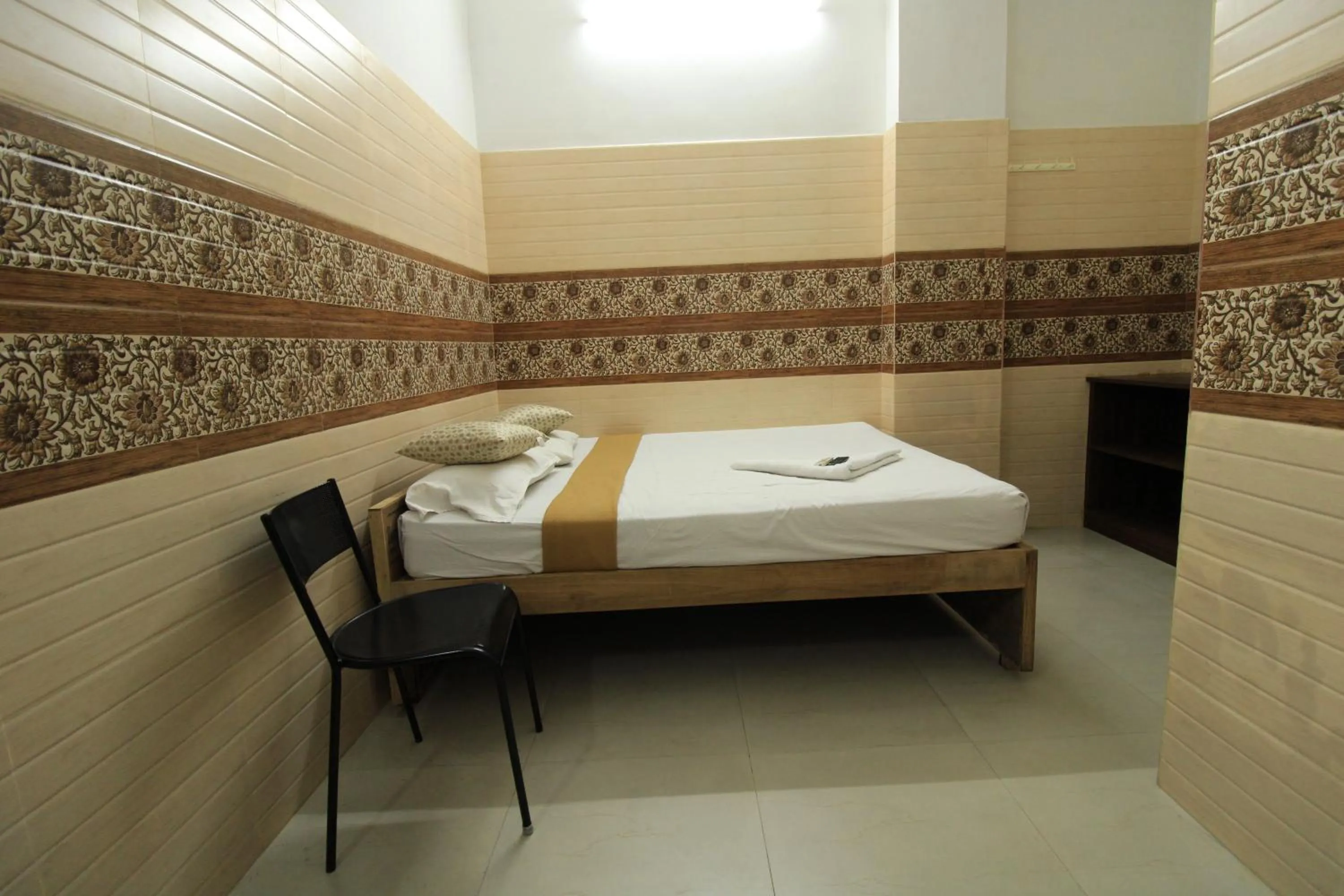 Bed in Just Guest House, Chennai Airport