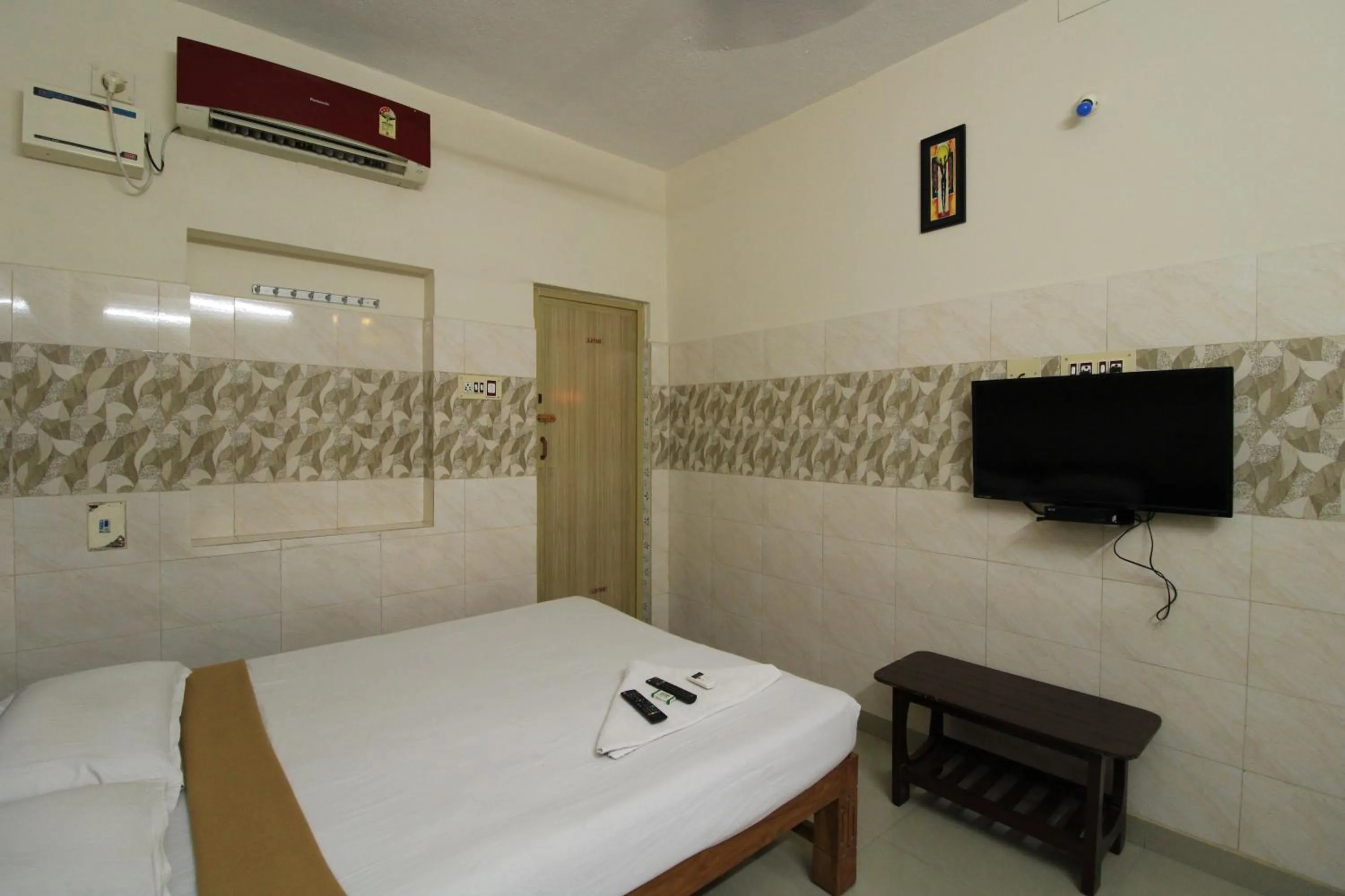 Bed in Just Guest House, Chennai Airport