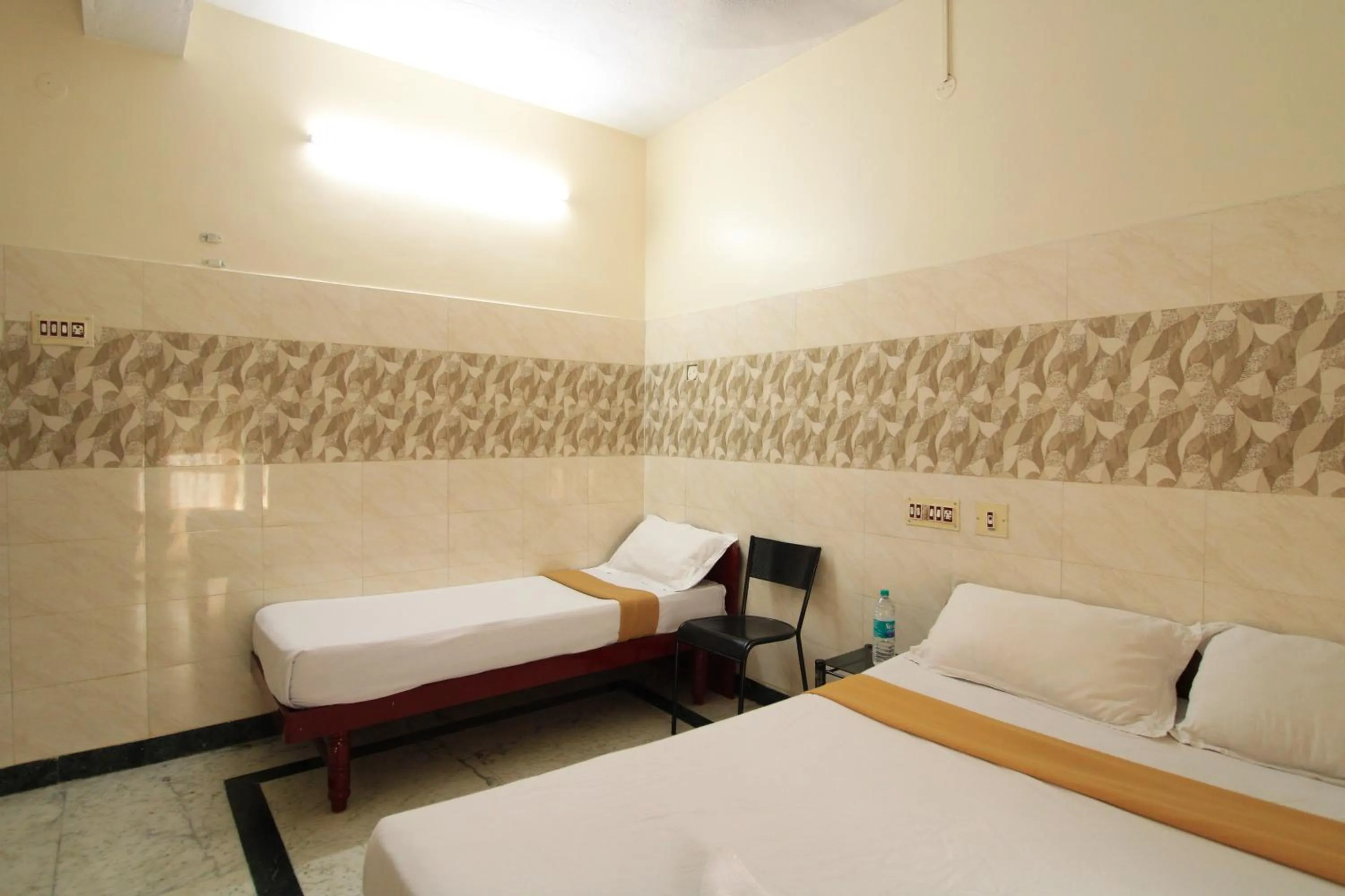 Bed in Just Guest House, Chennai Airport