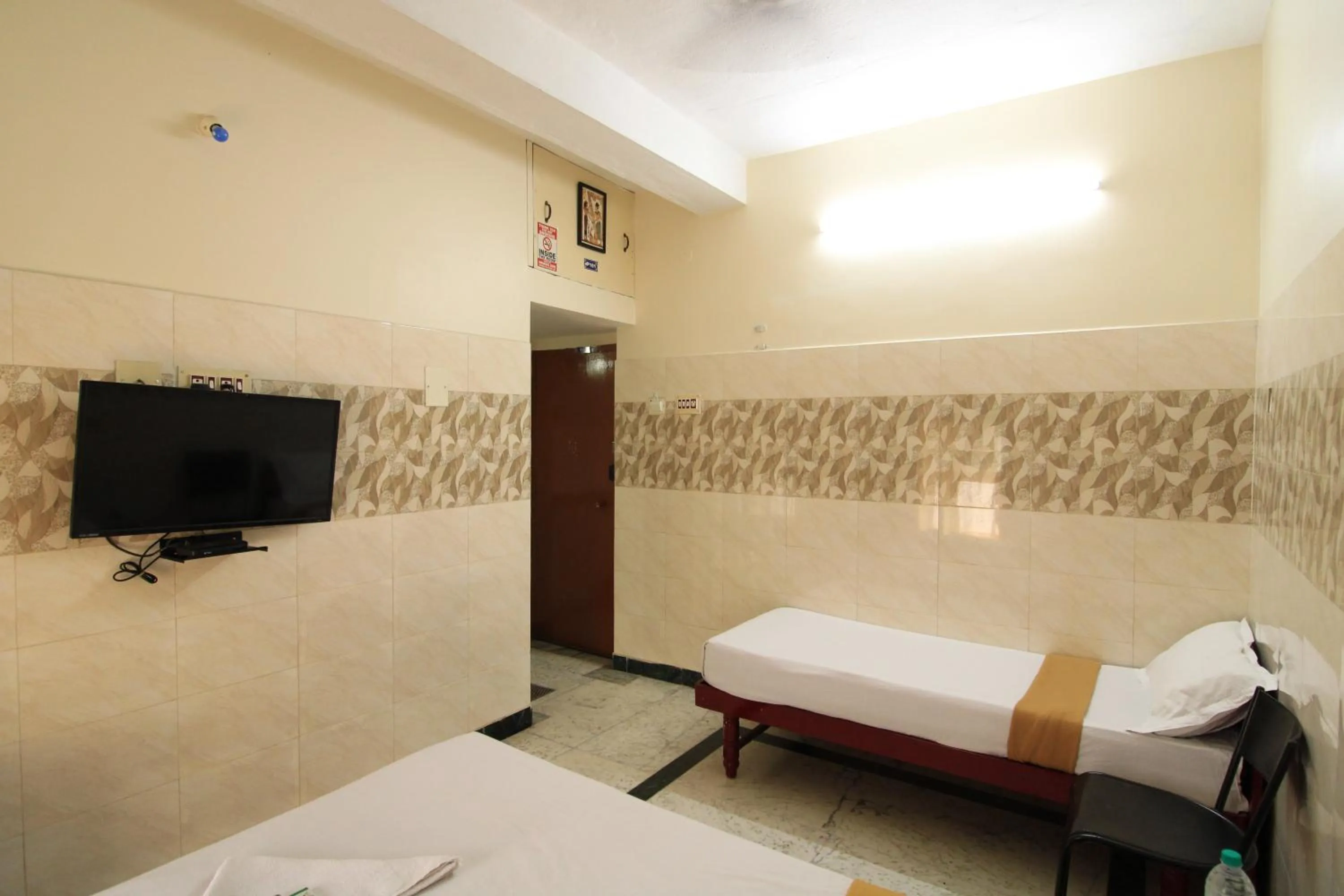 Bed in Just Guest House, Chennai Airport