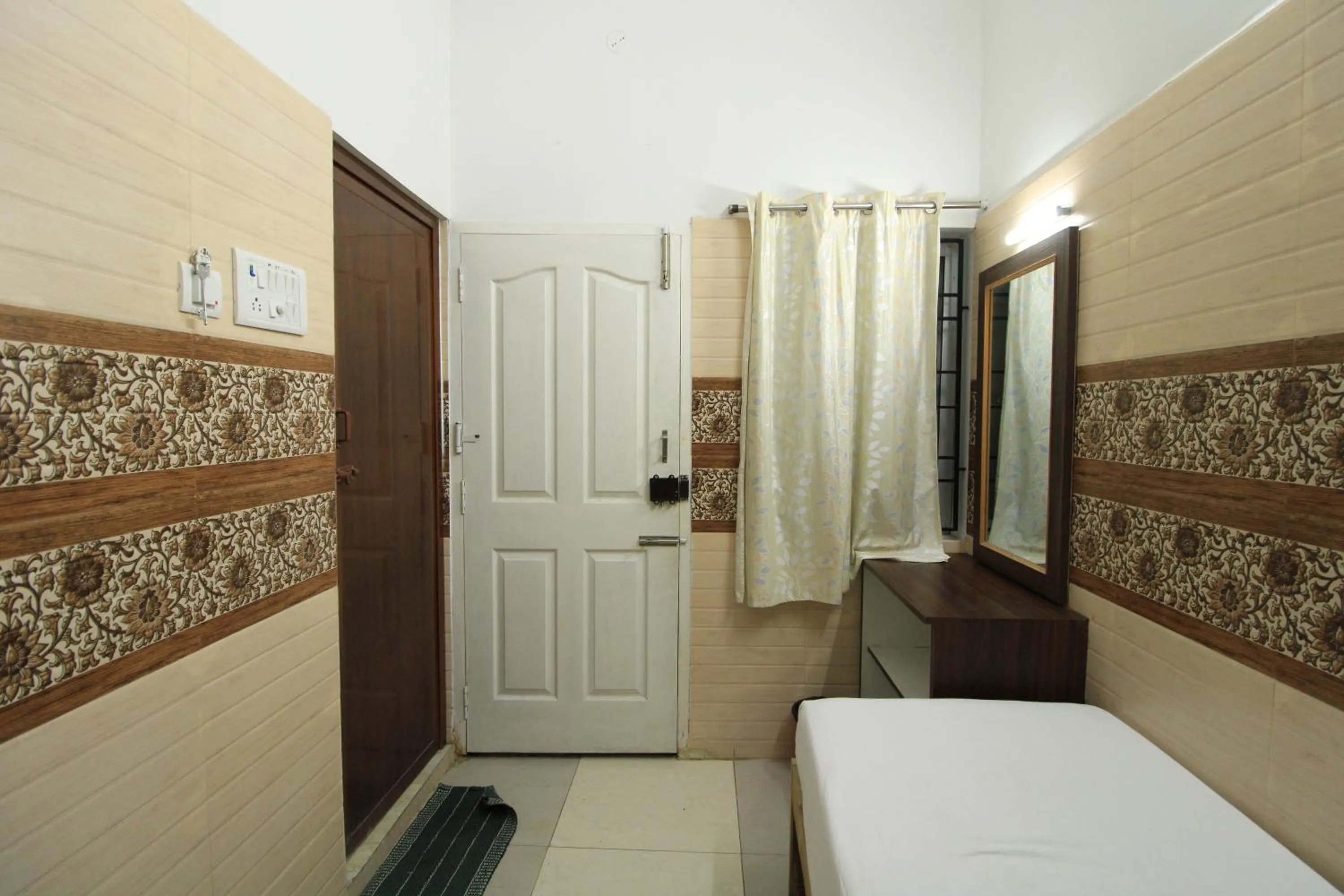 Bed in Just Guest House, Chennai Airport