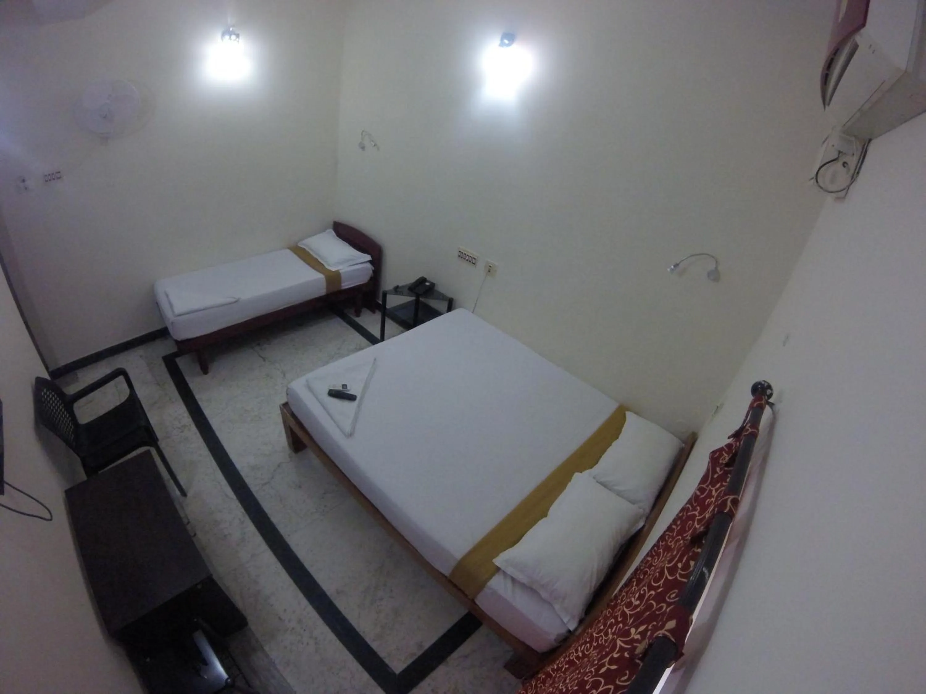 Bed in Just Guest House, Chennai Airport