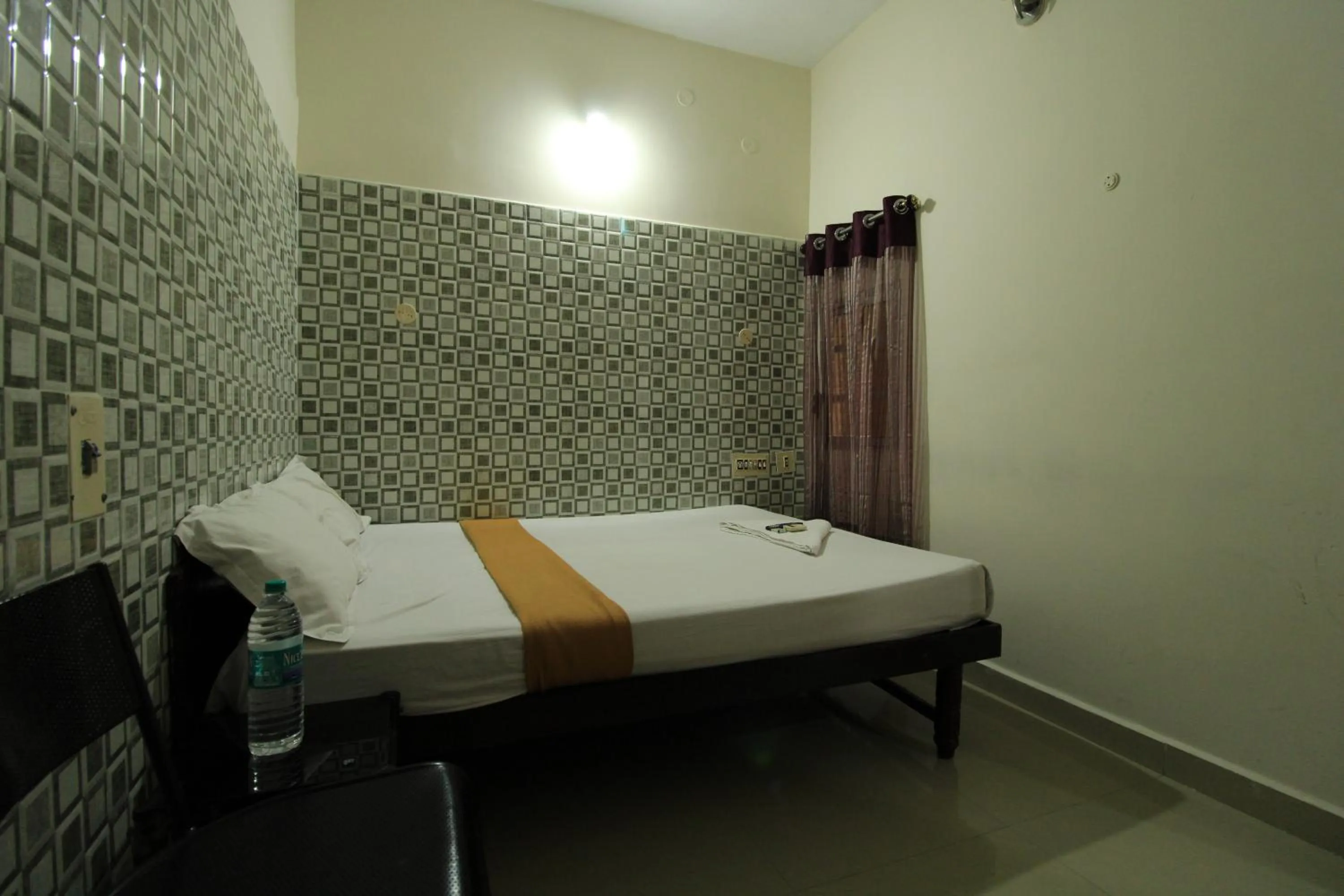 Bed in Just Guest House, Chennai Airport