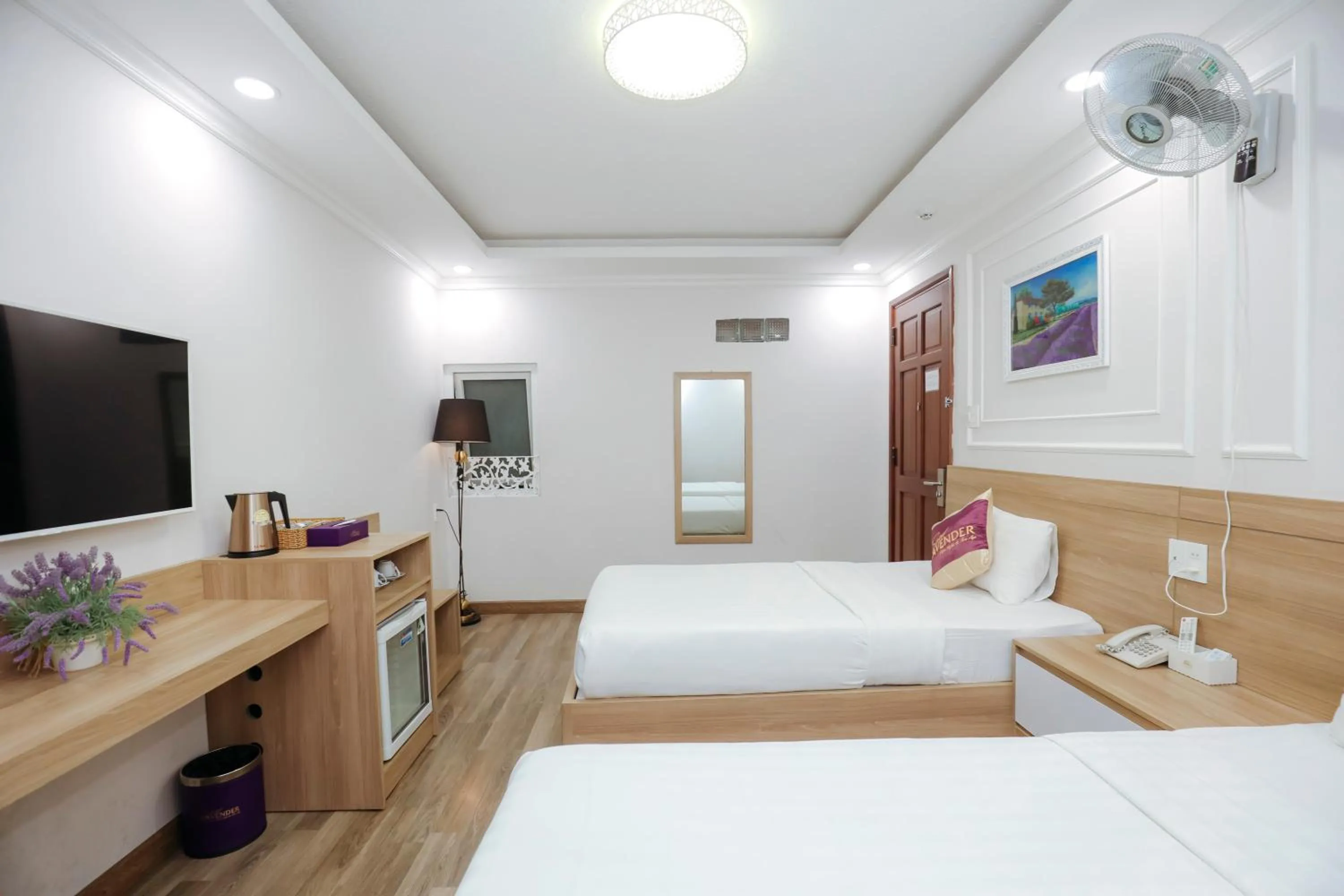 Communal lounge/ TV room, Bed in Sweet Lavender Hotel