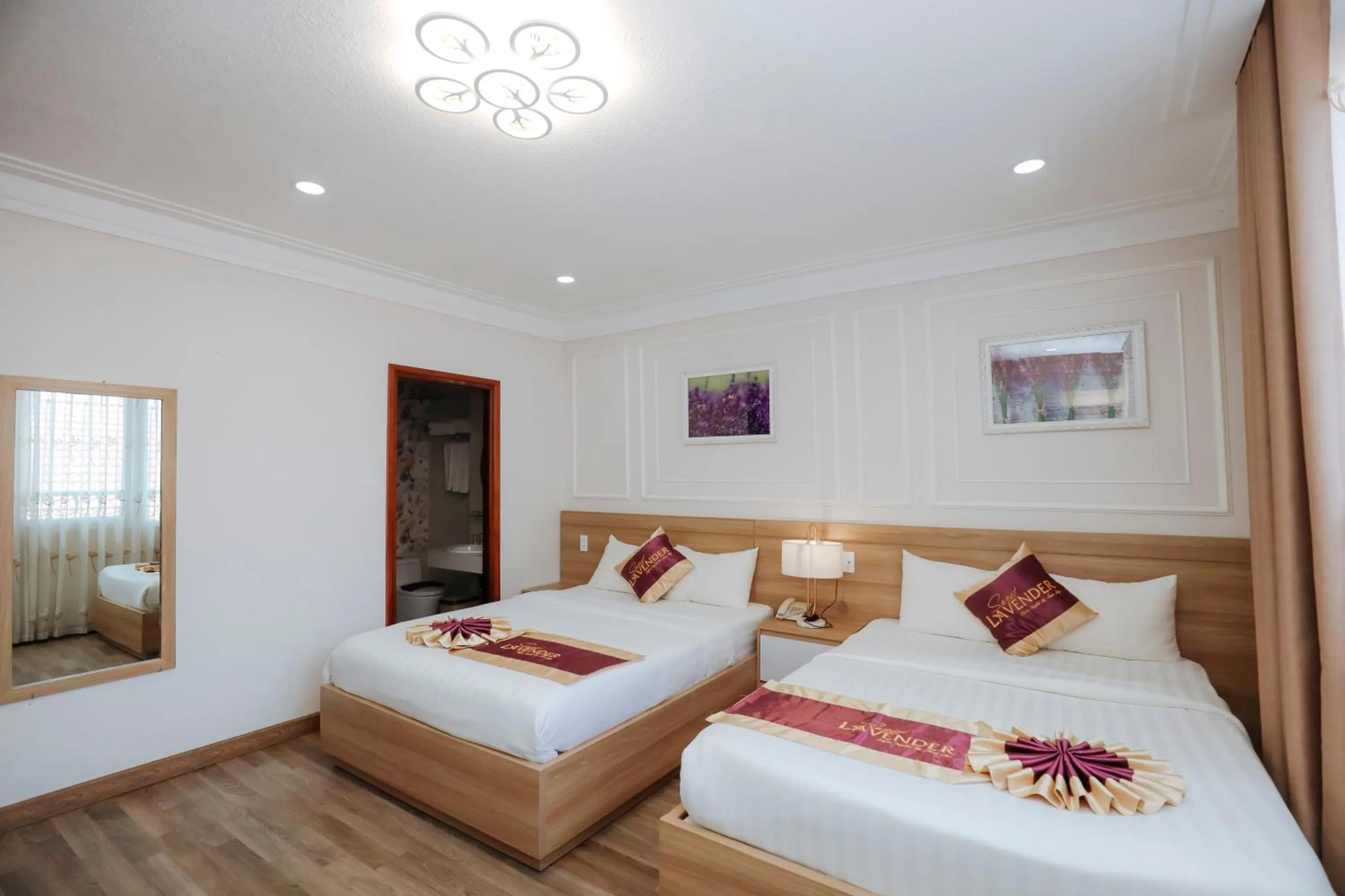 Photo of the whole room, Bed in Sweet Lavender Hotel