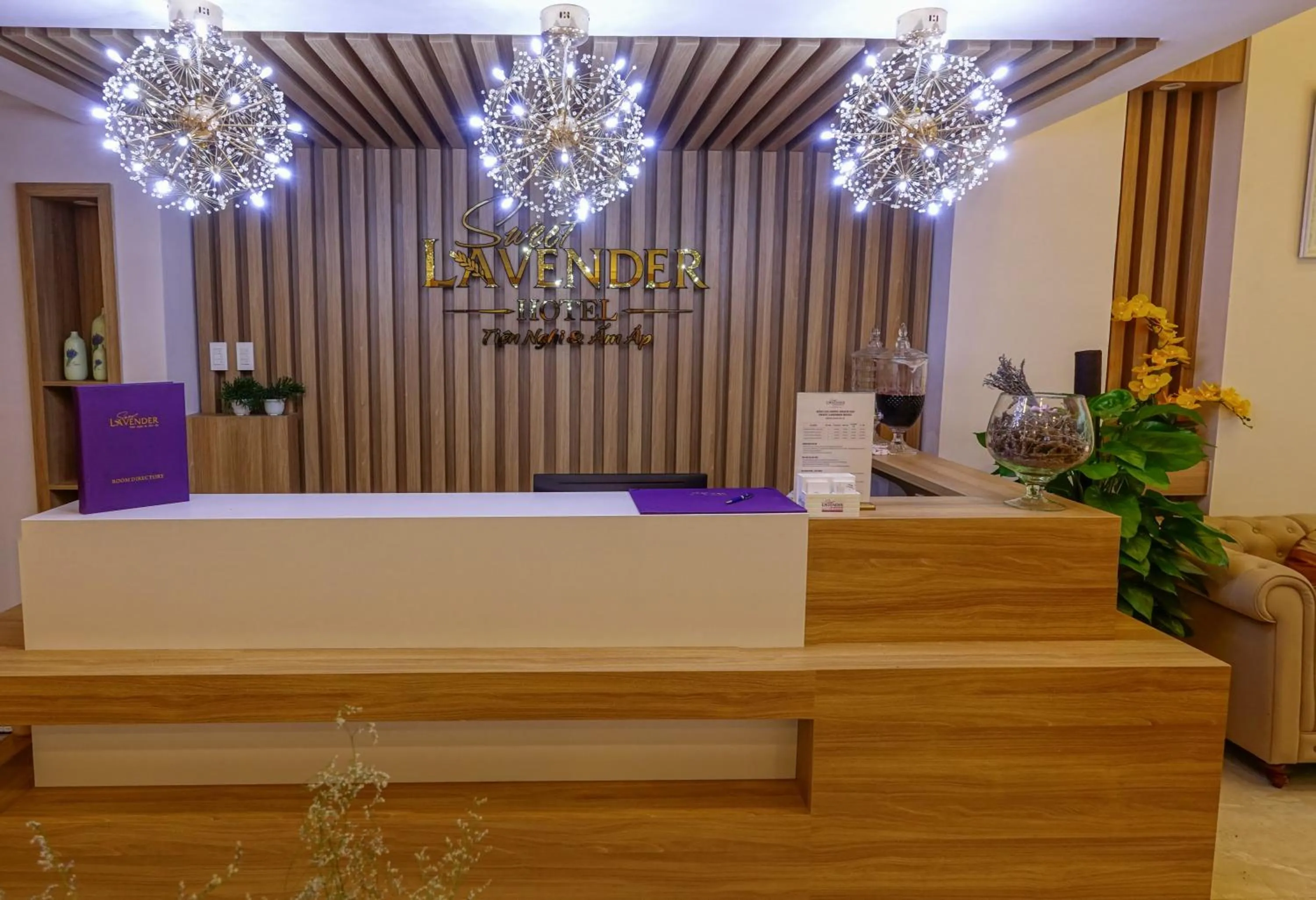 Property logo or sign in Sweet Lavender Hotel