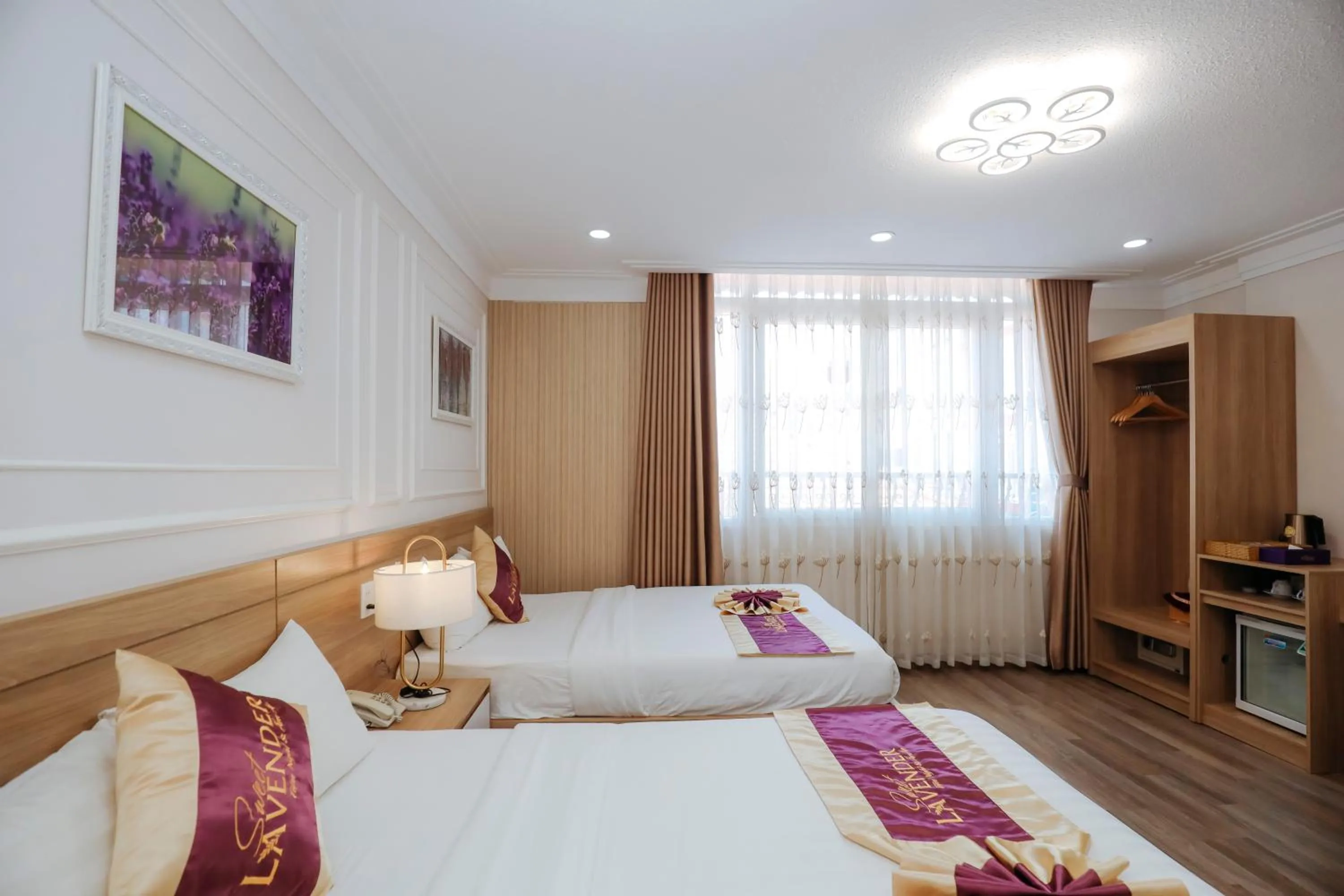 Bed in Sweet Lavender Hotel