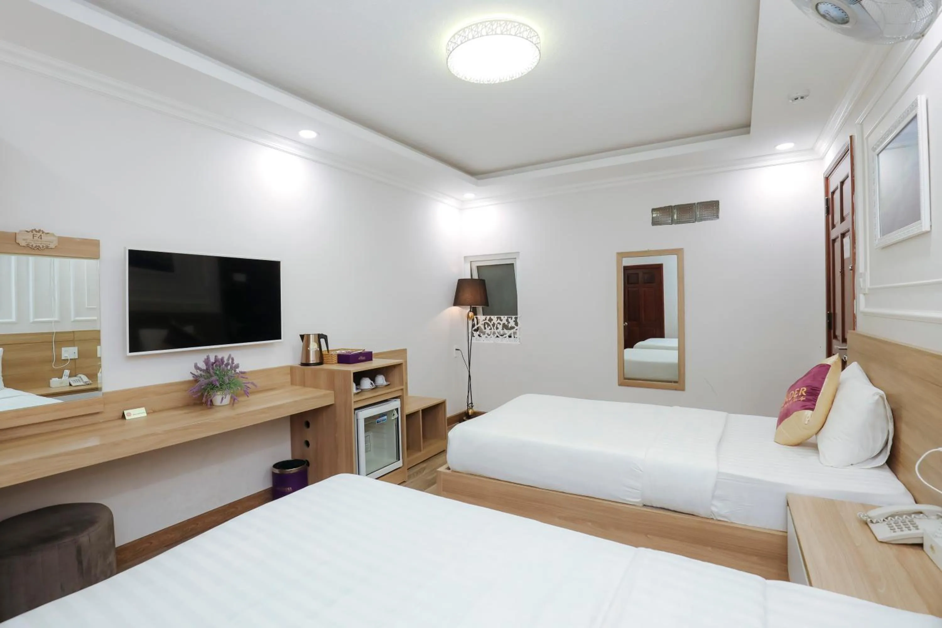 Bed in Sweet Lavender Hotel