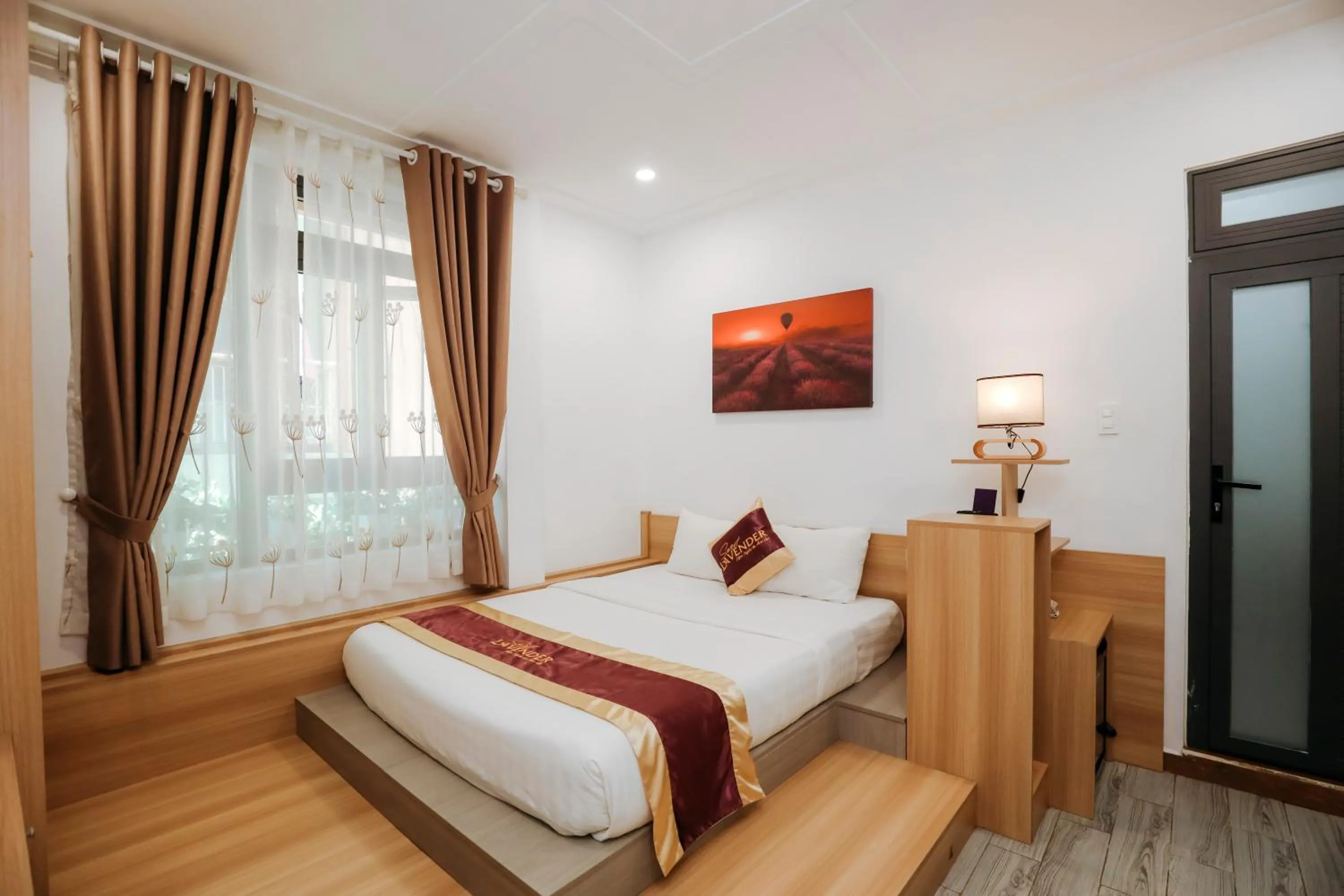 Bed in Sweet Lavender Hotel