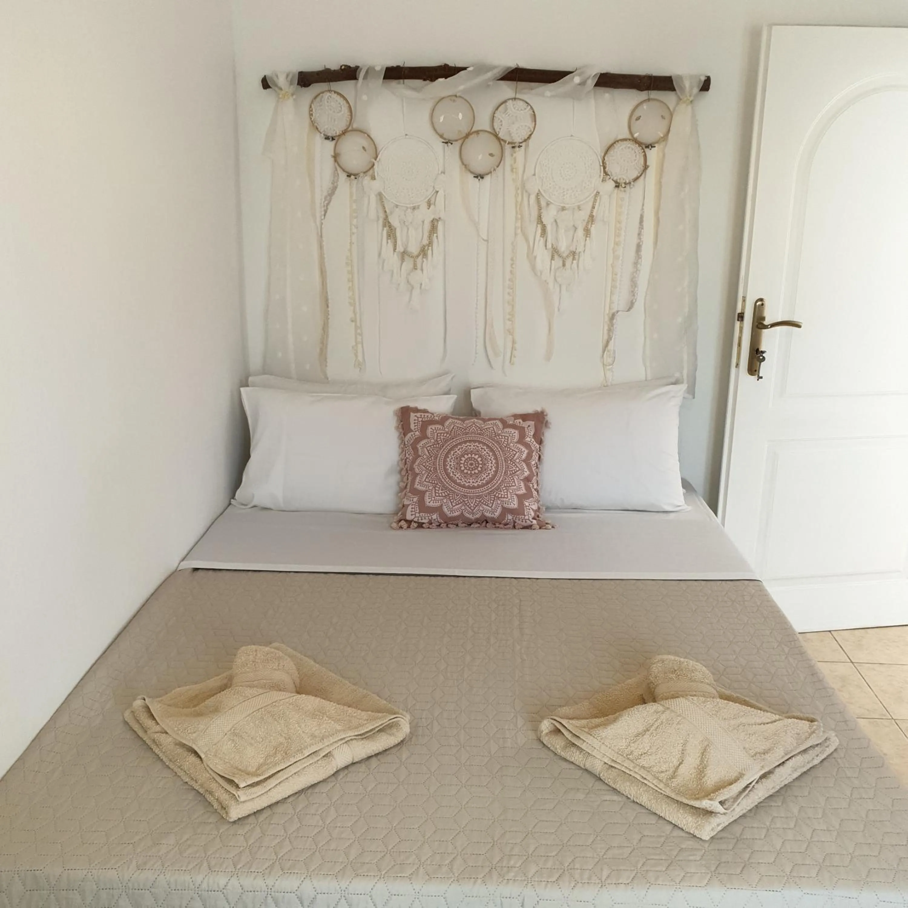 Bed in Sagma Central Rooms