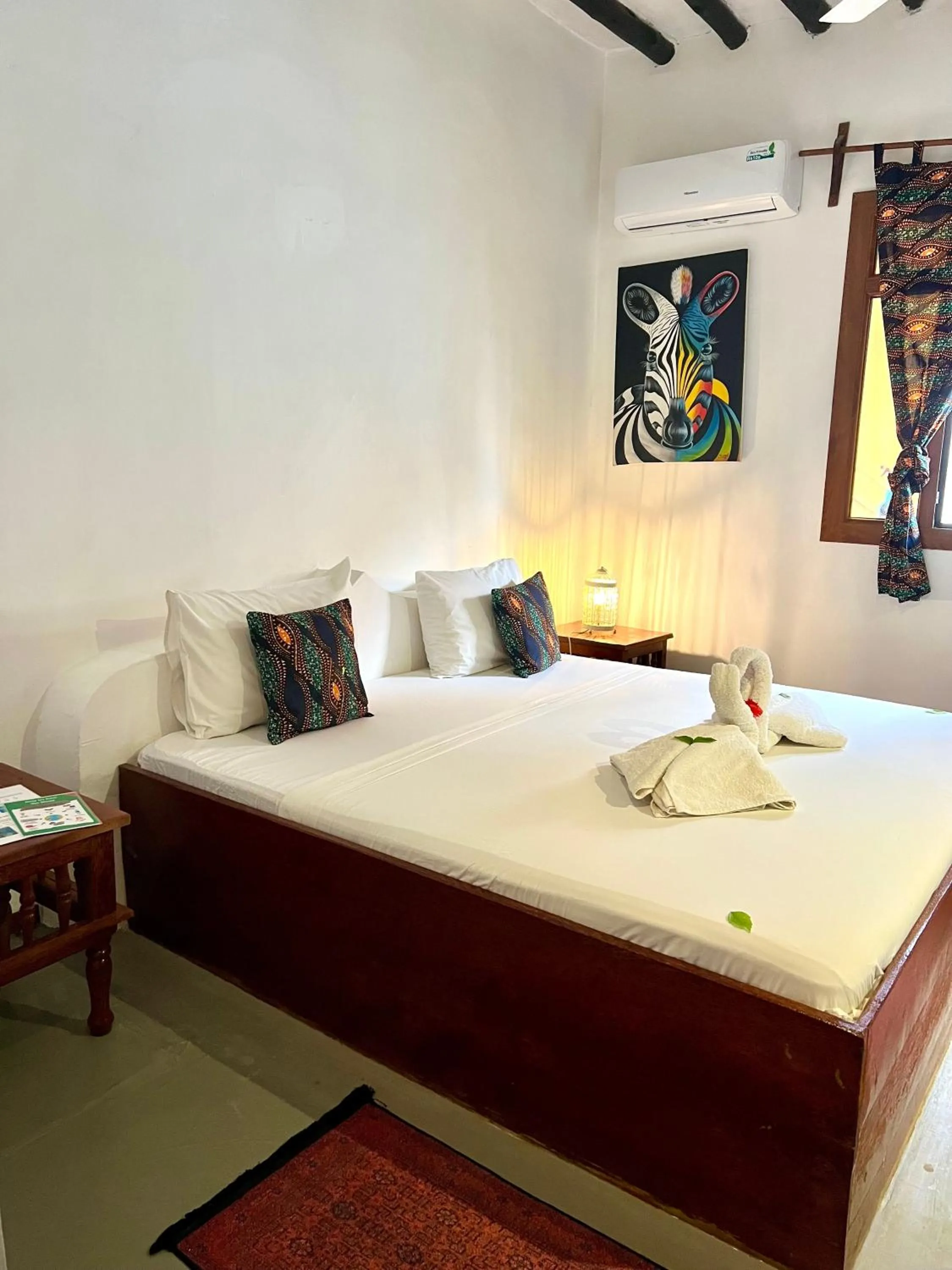 Bed in The African Paradise Beach Hotel