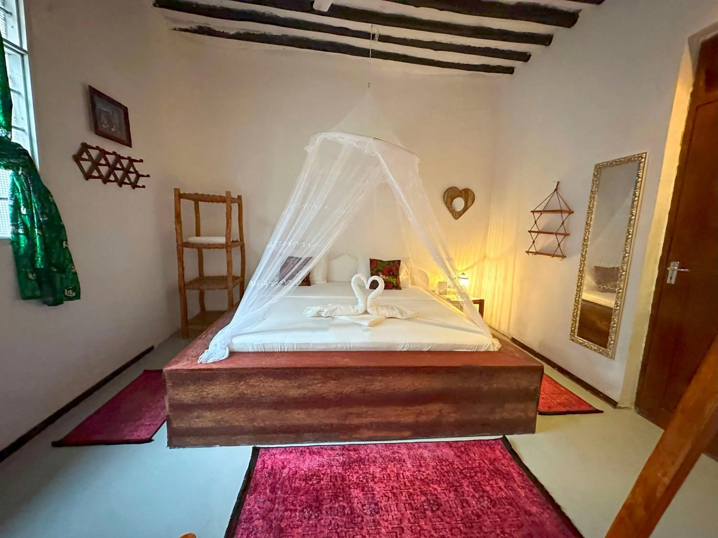 Bed in The African Paradise Beach Hotel