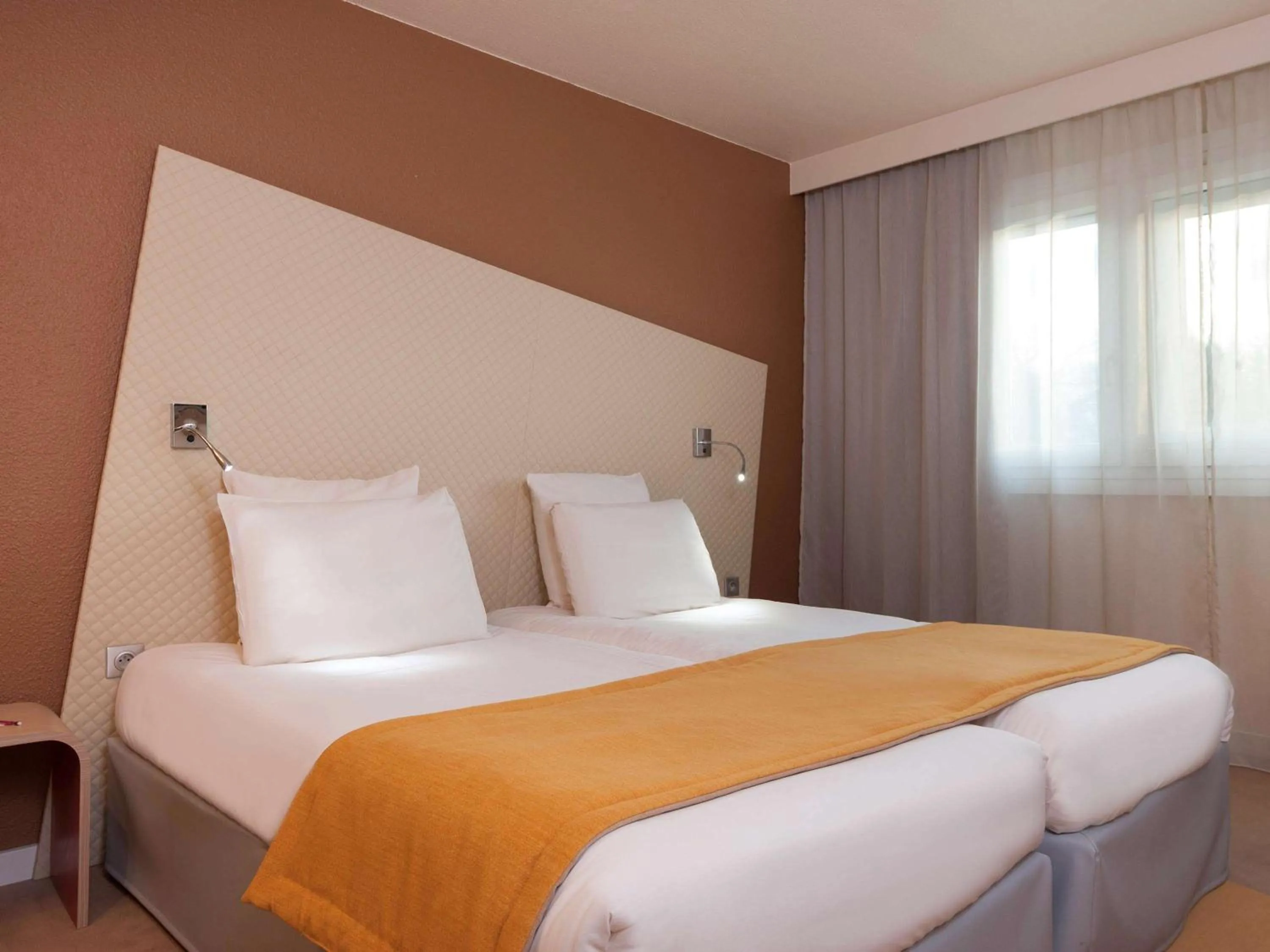 Photo of the whole room, Bed in Mercure Paris Le Bourget Aeroport