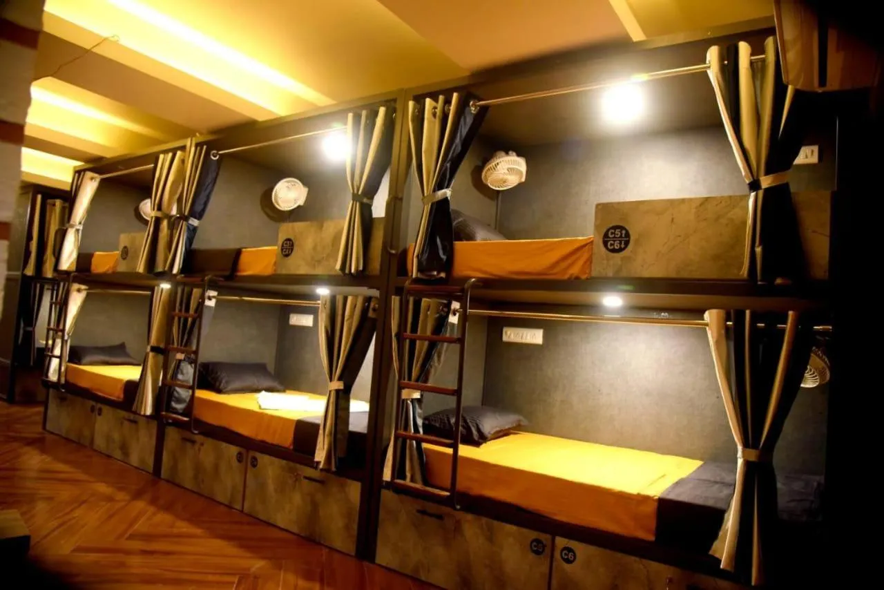 bunk bed in CHARYANA HOTEL AC DORMITORY