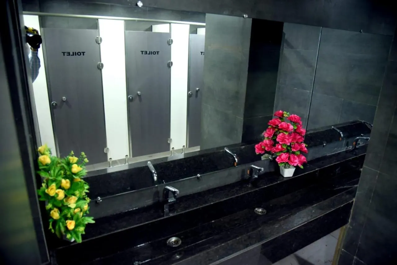 Bathroom in CHARYANA HOTEL AC DORMITORY