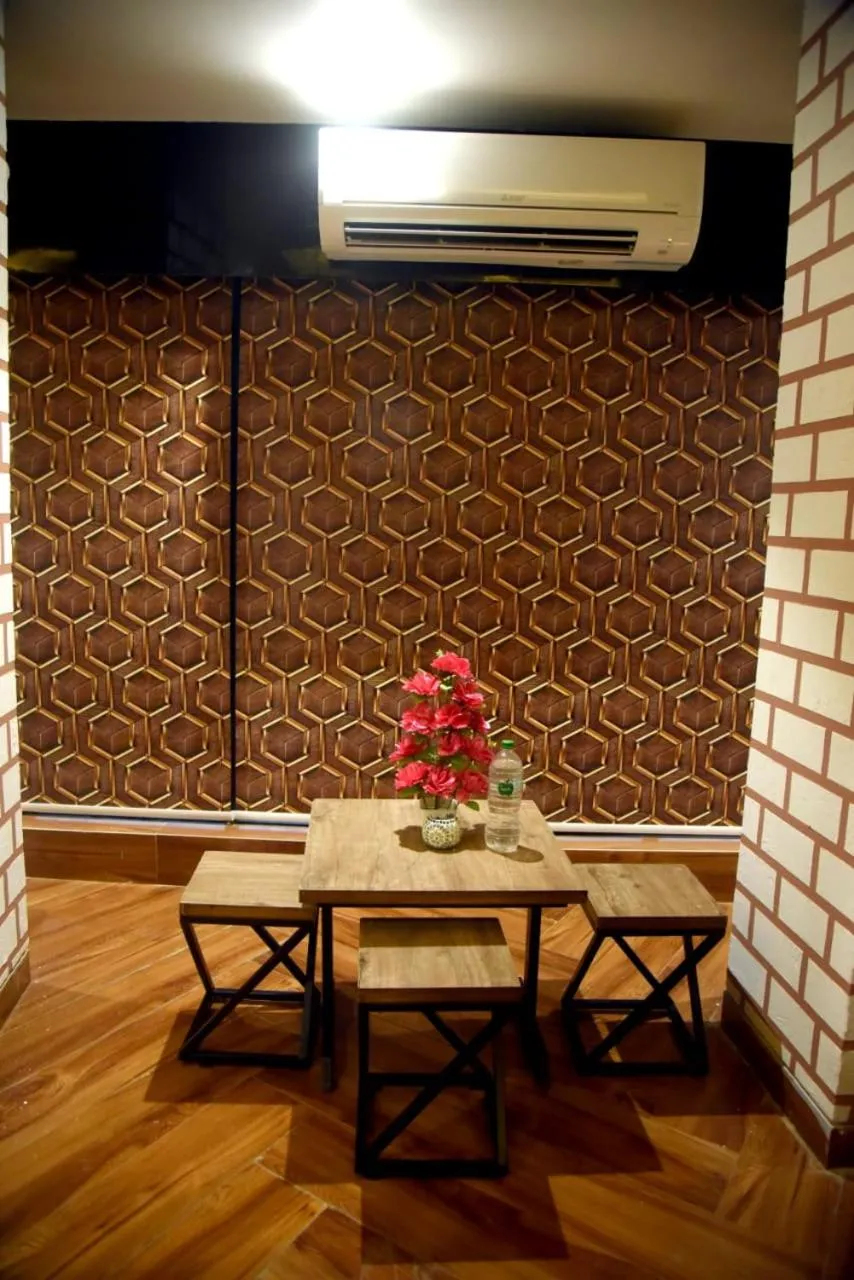 Dining area in CHARYANA HOTEL AC DORMITORY