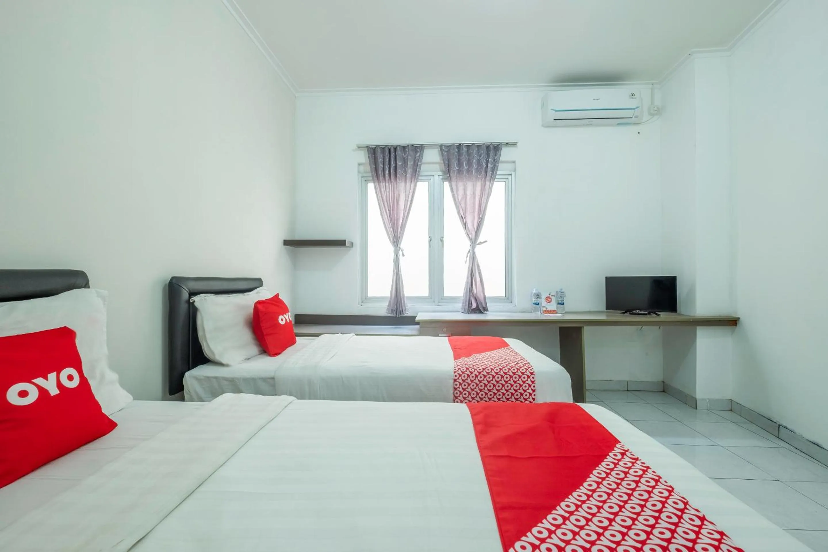 Bedroom in OYO 1876 Fortuna Residence