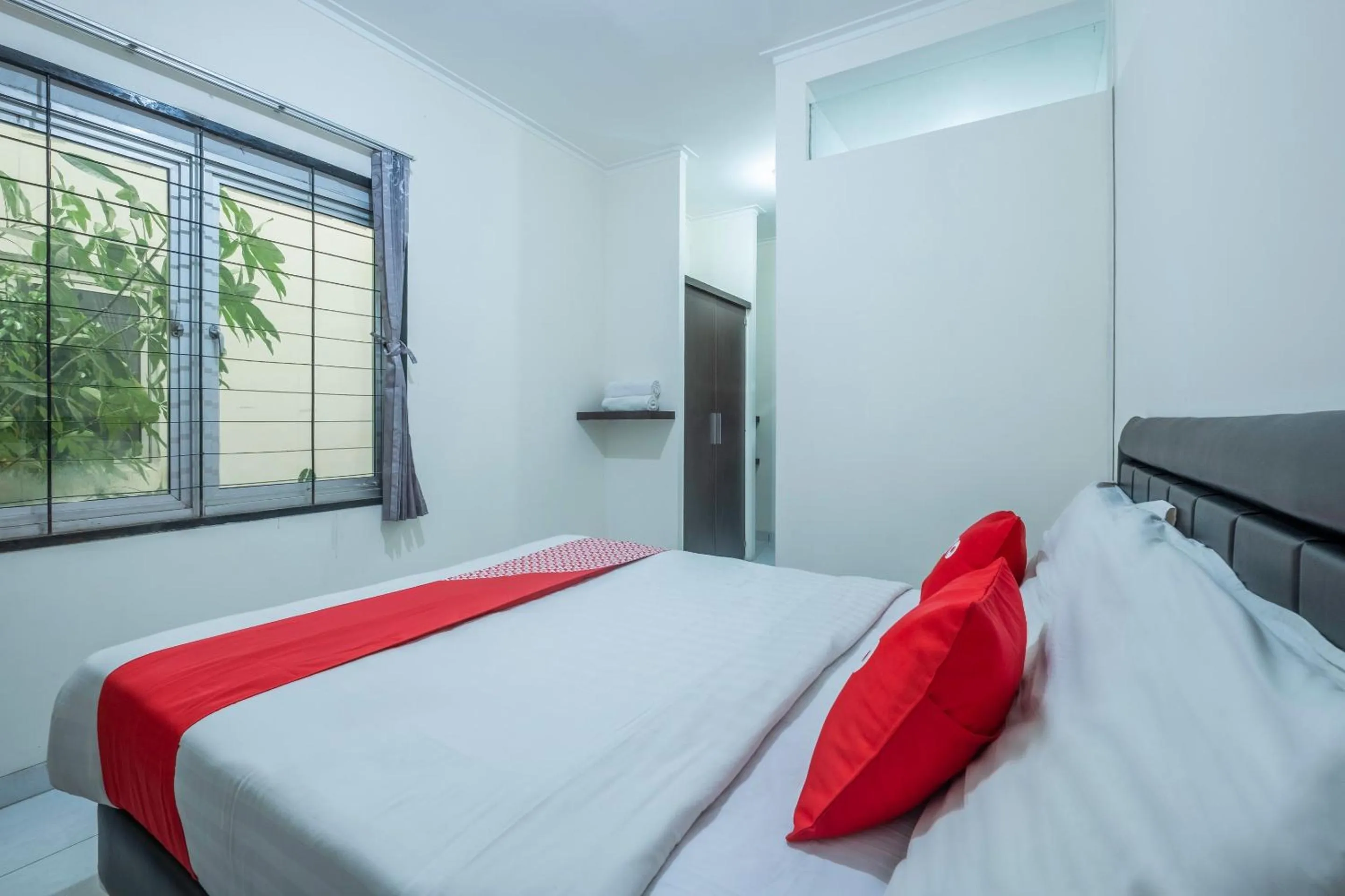 Bedroom in OYO 1876 Fortuna Residence