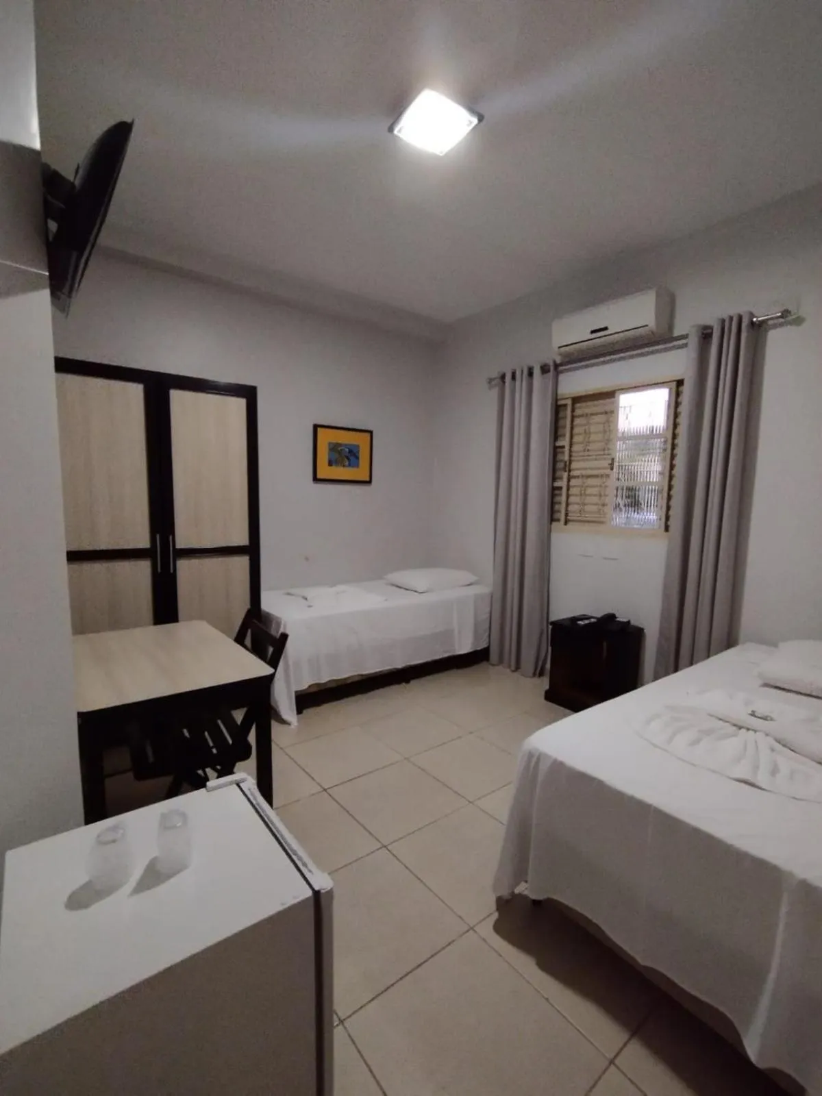 Bed in Hotel Pousada Calliandra