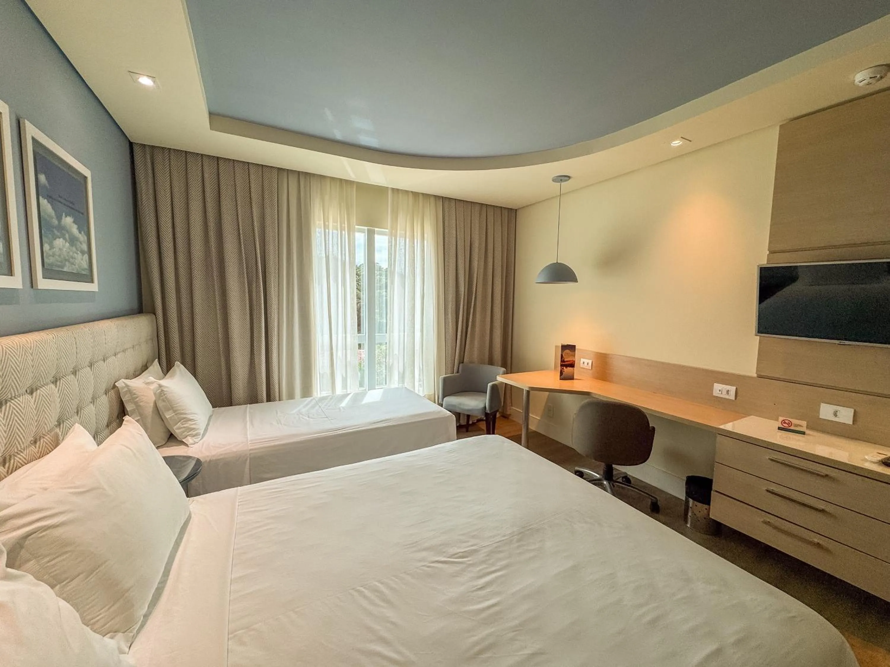 Bed in Kayrós Business Hotel