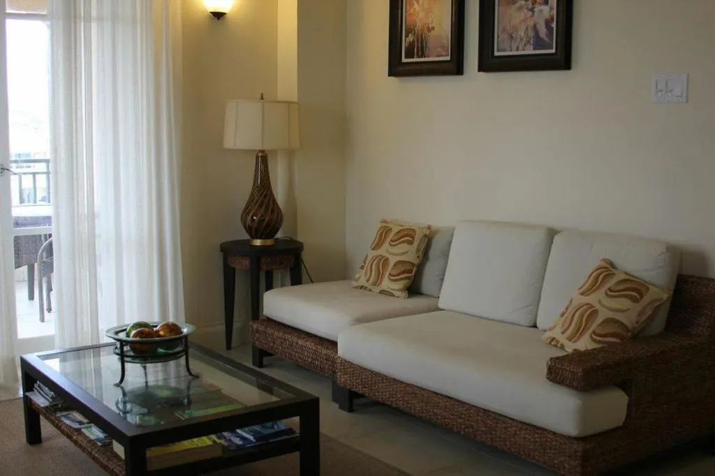 Living room in White Sands Beach Condos