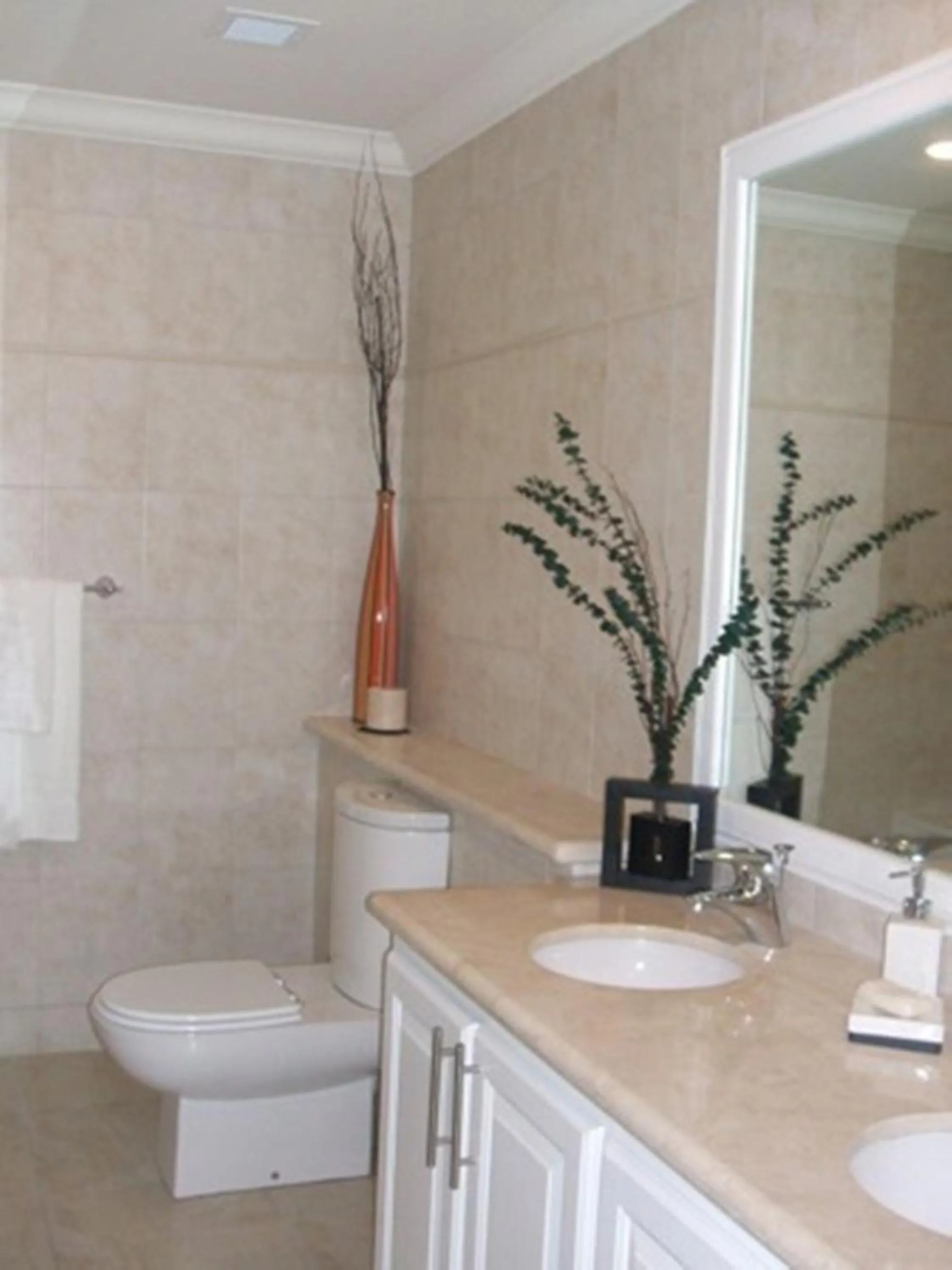 Bathroom in White Sands Beach Condos