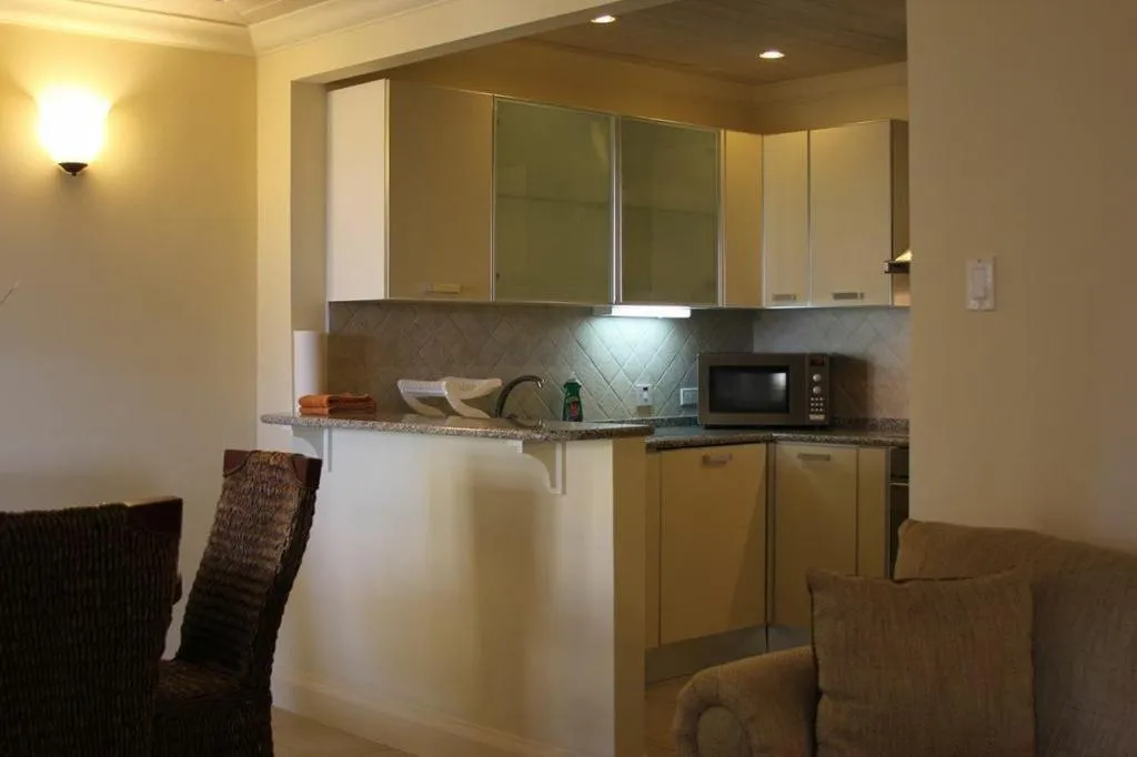 Kitchen or kitchenette in White Sands Beach Condos