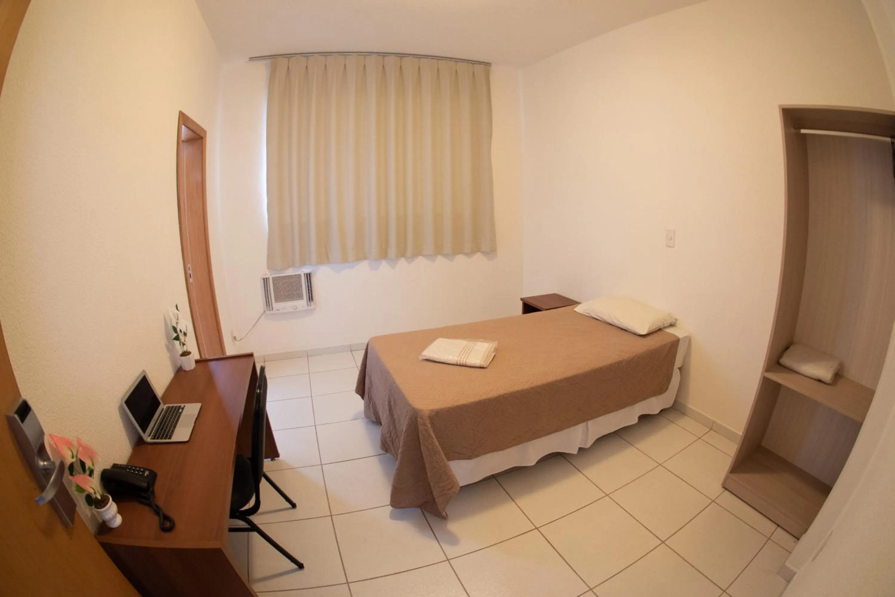 Bed in Getúllio Hotel