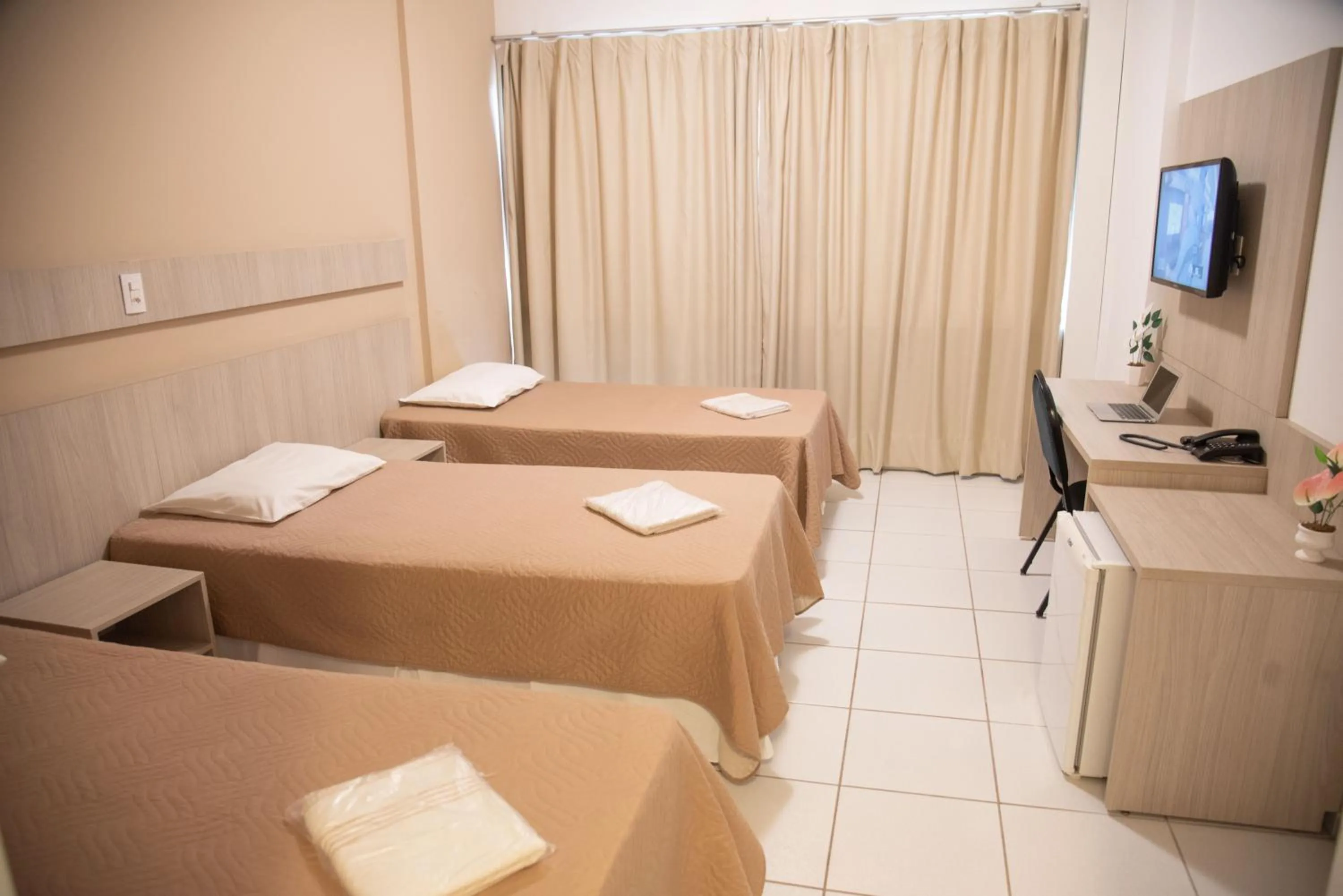 Bed in Getúllio Hotel