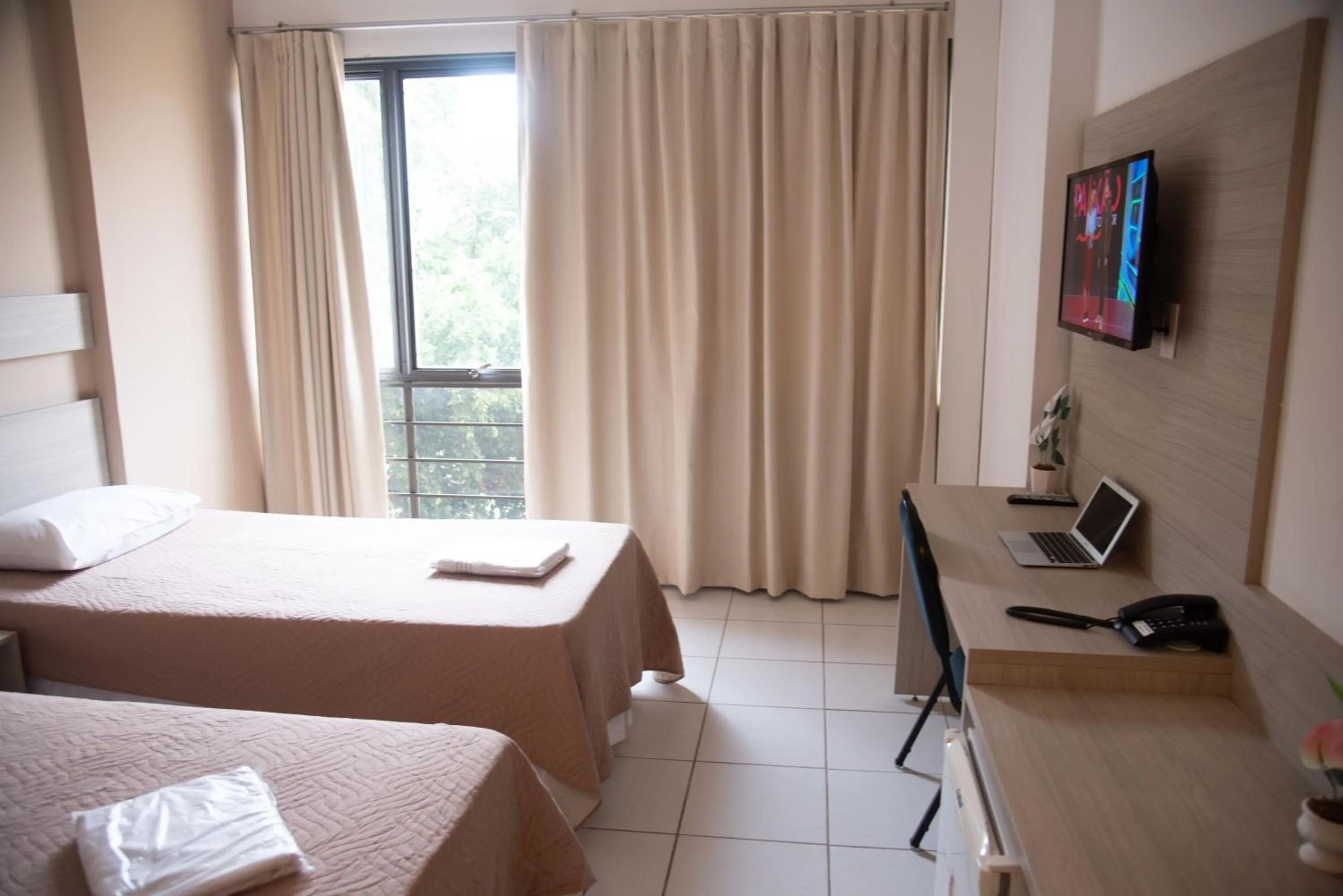 Bed in Getúllio Hotel