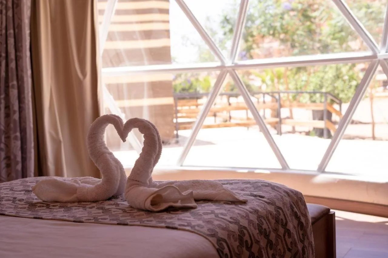 Bed in Al Sultana Luxury Camp