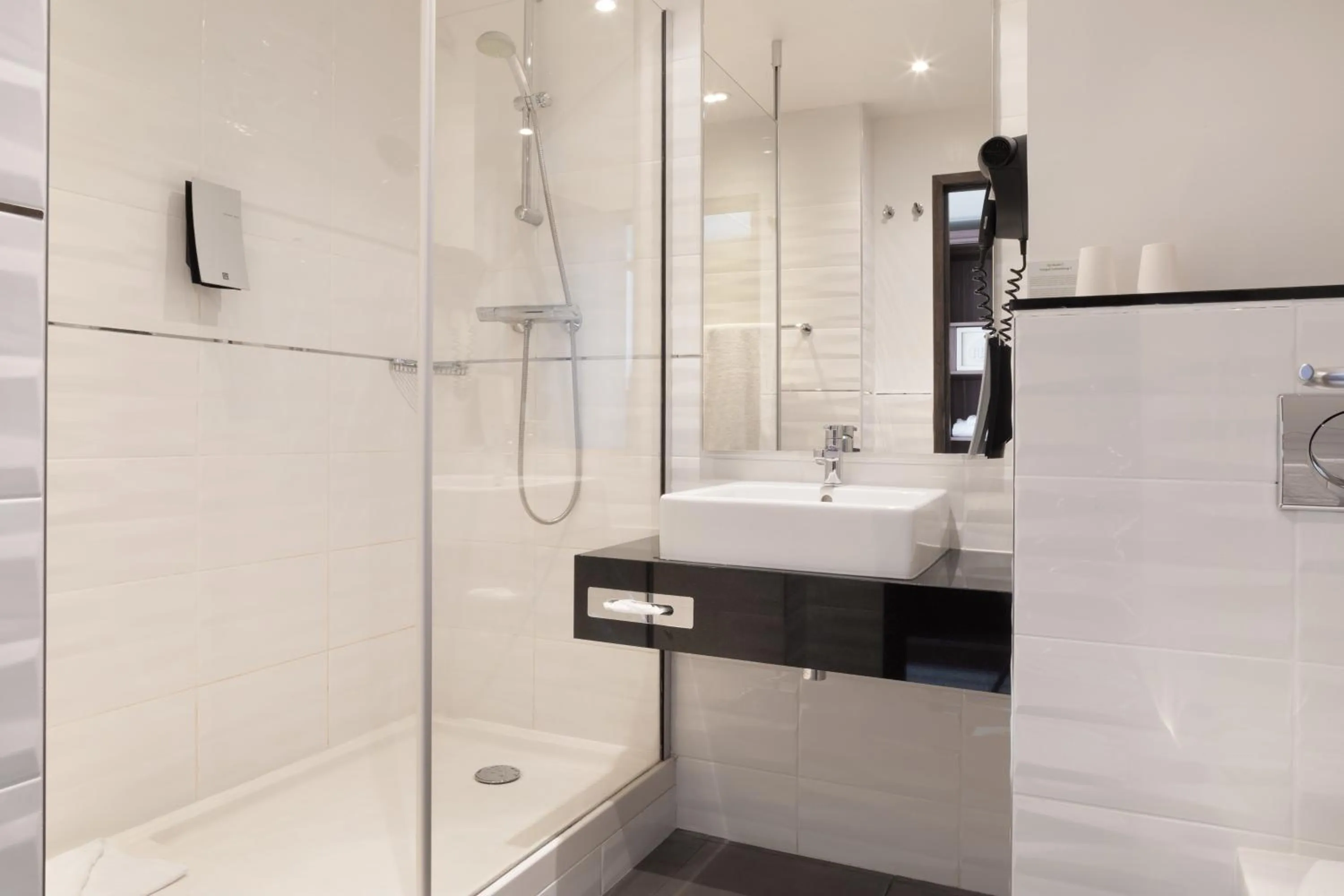 Bathroom in Holiday Inn Lille Ouest Englos by IHG