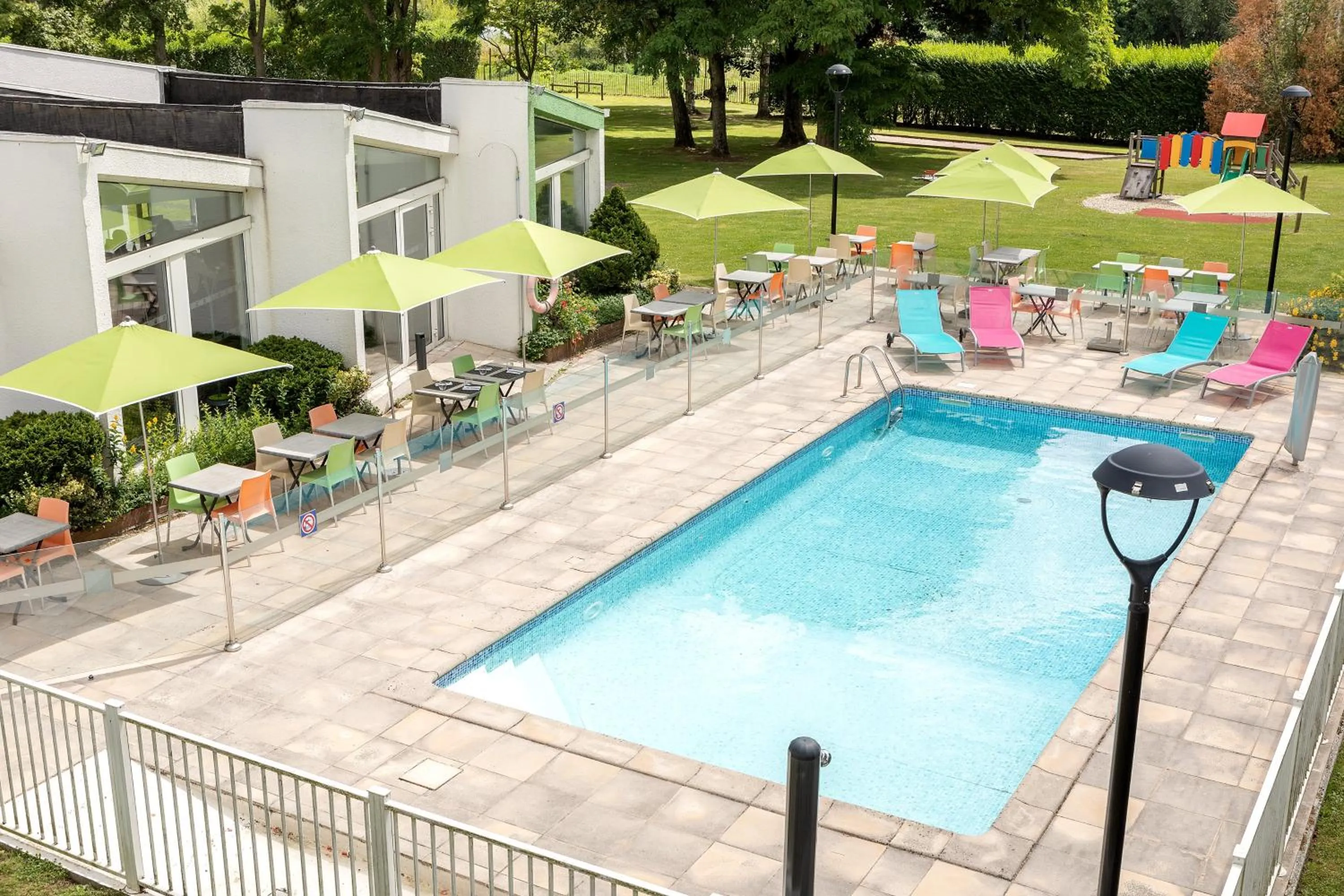 Swimming pool in Holiday Inn Lille Ouest Englos by IHG