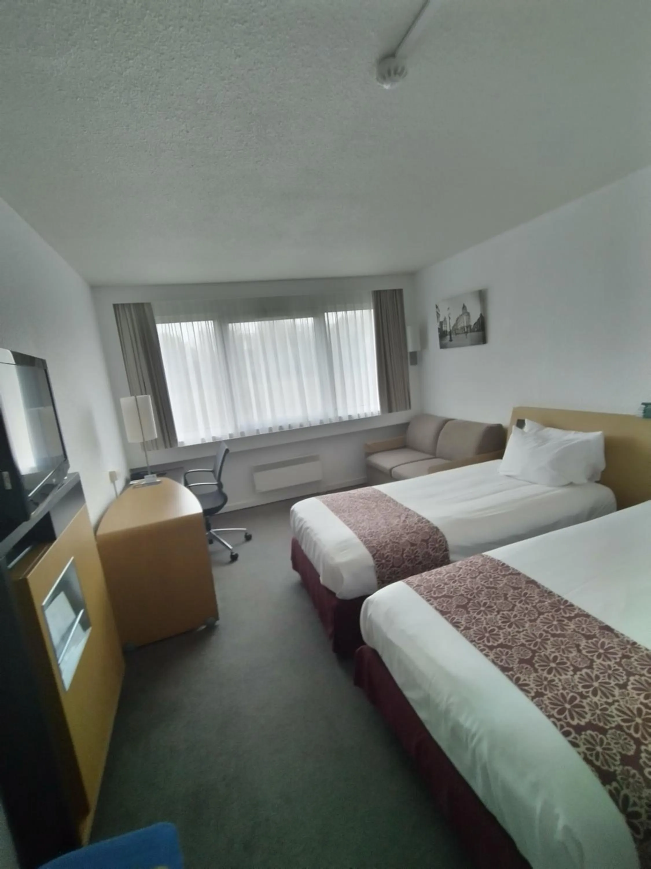 Photo of the whole room, Bed in Holiday Inn Lille Ouest Englos by IHG