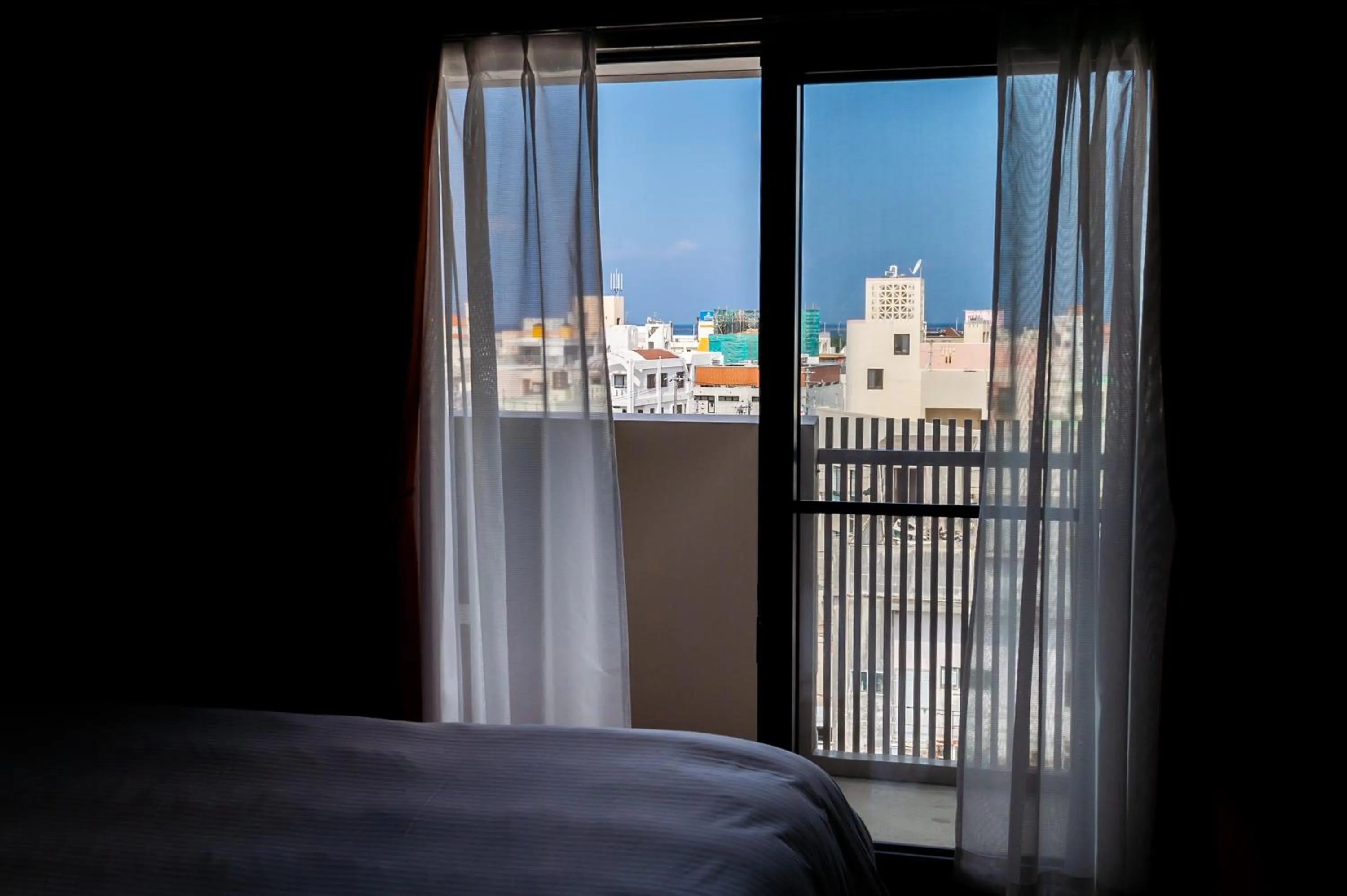 City view, Bed in Hotel Little Island Okinawa Matsuyama