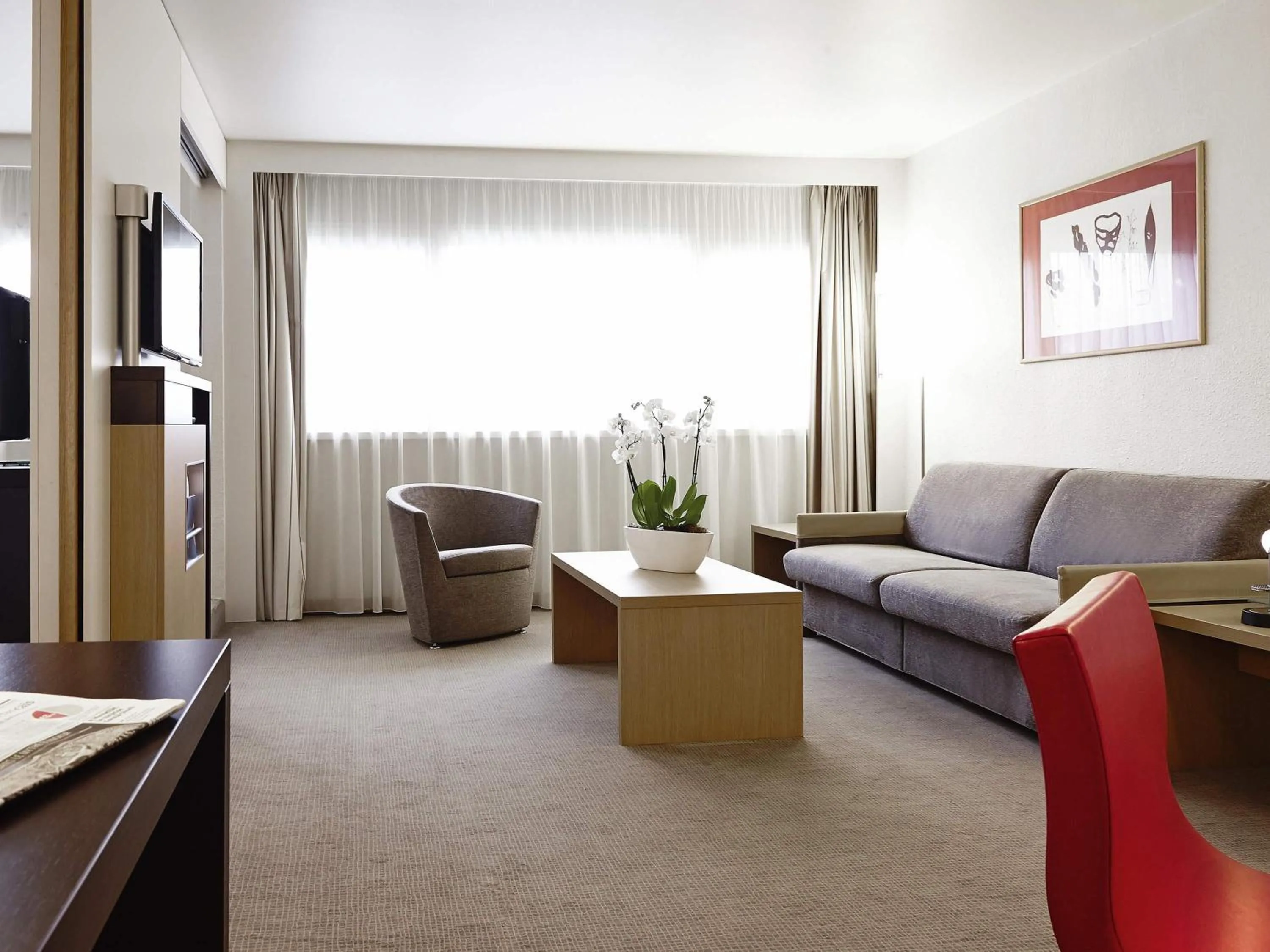 Bedroom in Novotel Saint-Quentin en Yvelines