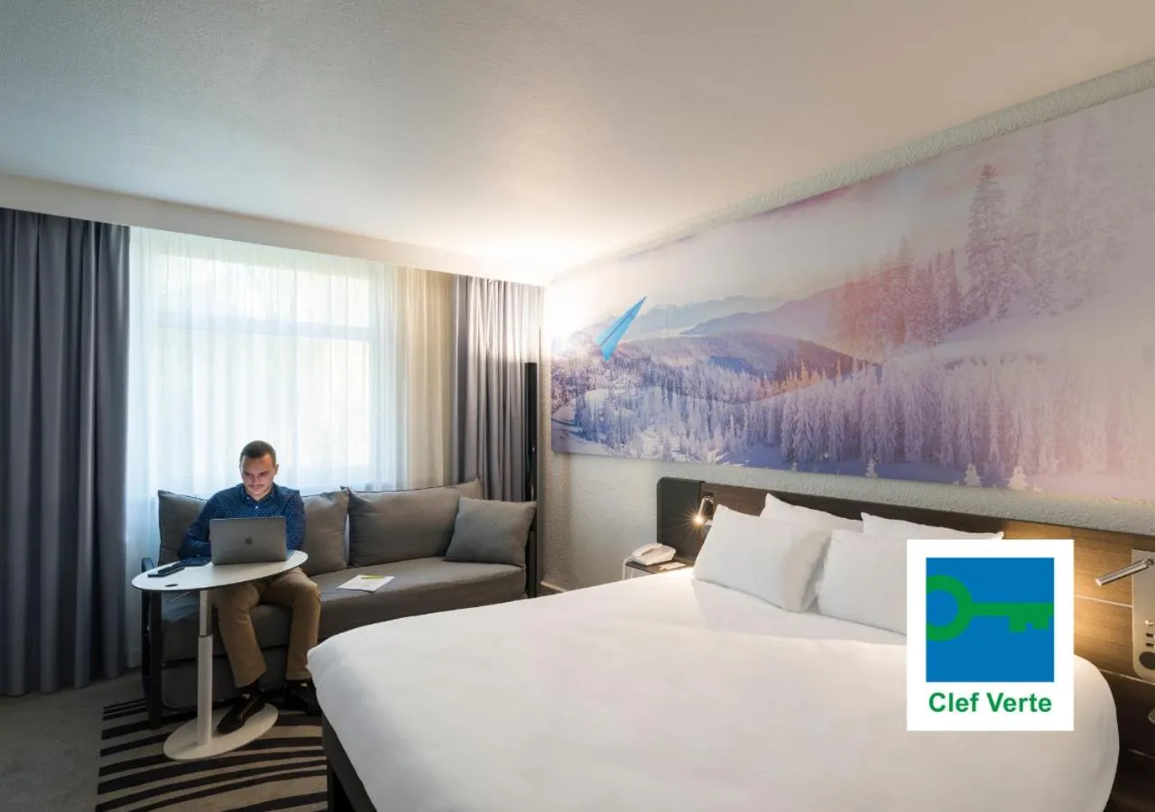 Photo of the whole room, Bed in Novotel Lyon Bron Meeting & Events