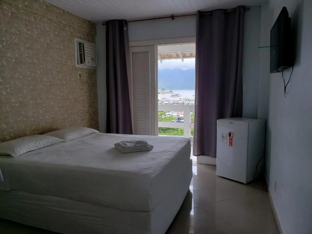 Photo of the whole room, Bed in Pousada Casa da Praia