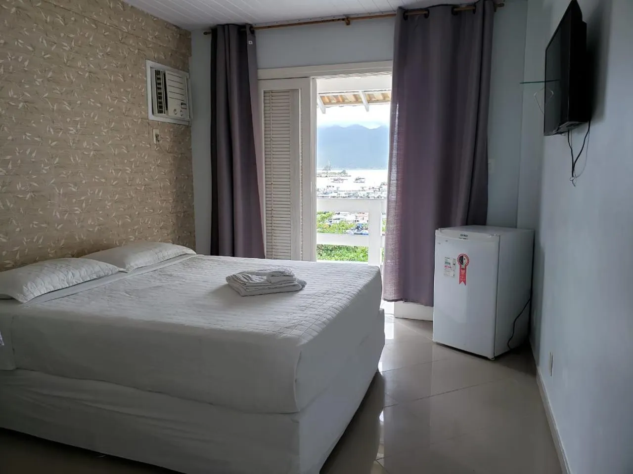 Bed in Pousada Casa da Praia