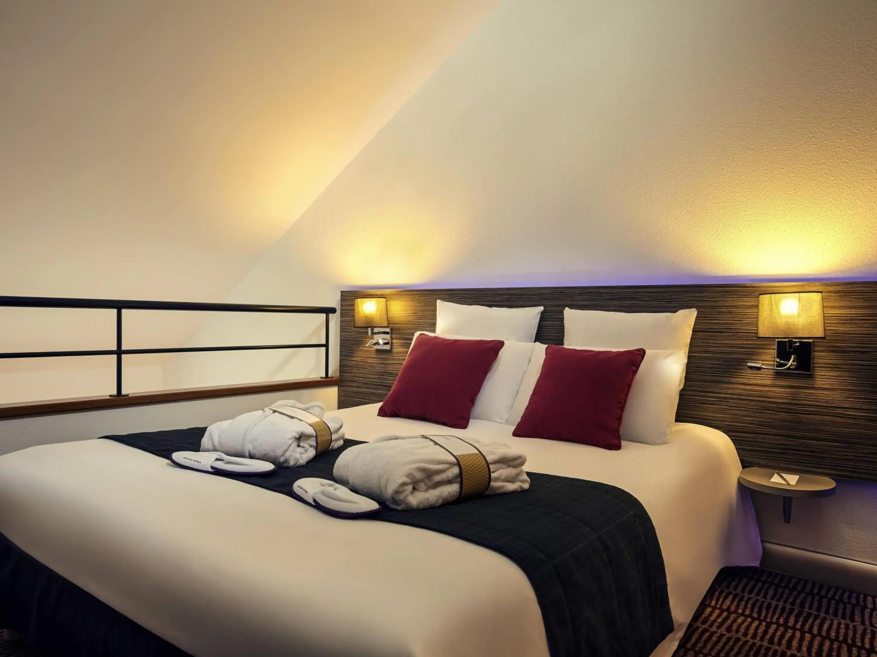 Duplex Privilege Room with a double bed and single sofa bed in Hotel Mercure Blois Centre Duplex Privilege Room with a double bed and single sofa bed in Hotel Mercure Blois Centre