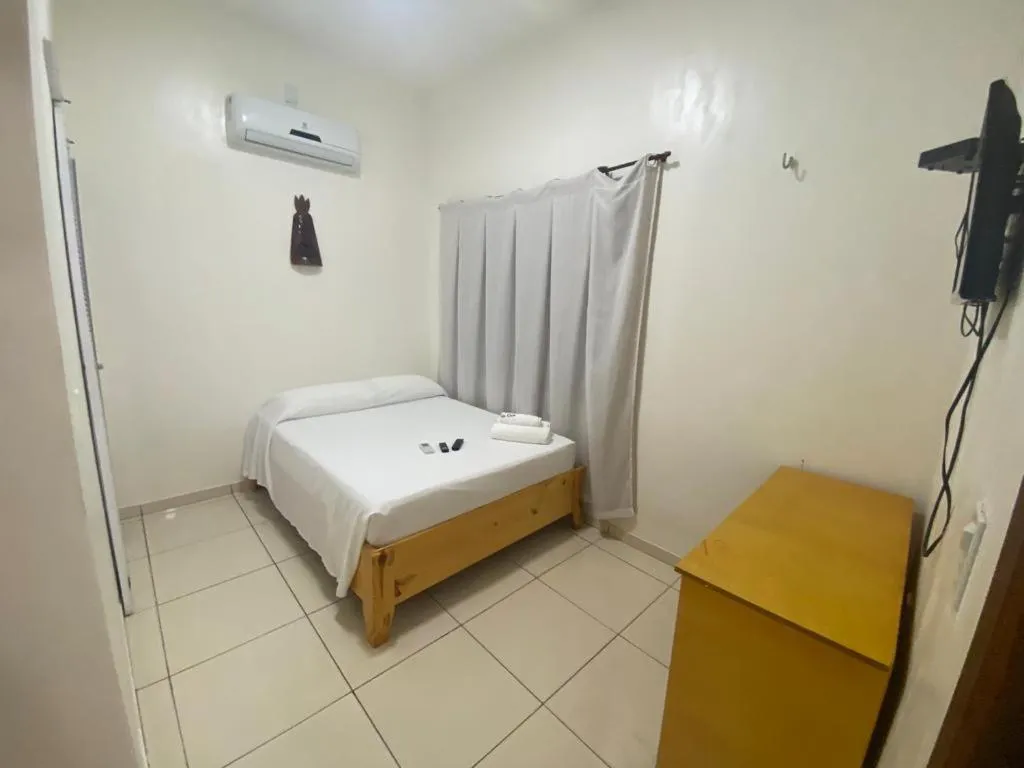 Bed in Pousada Casa da Cion