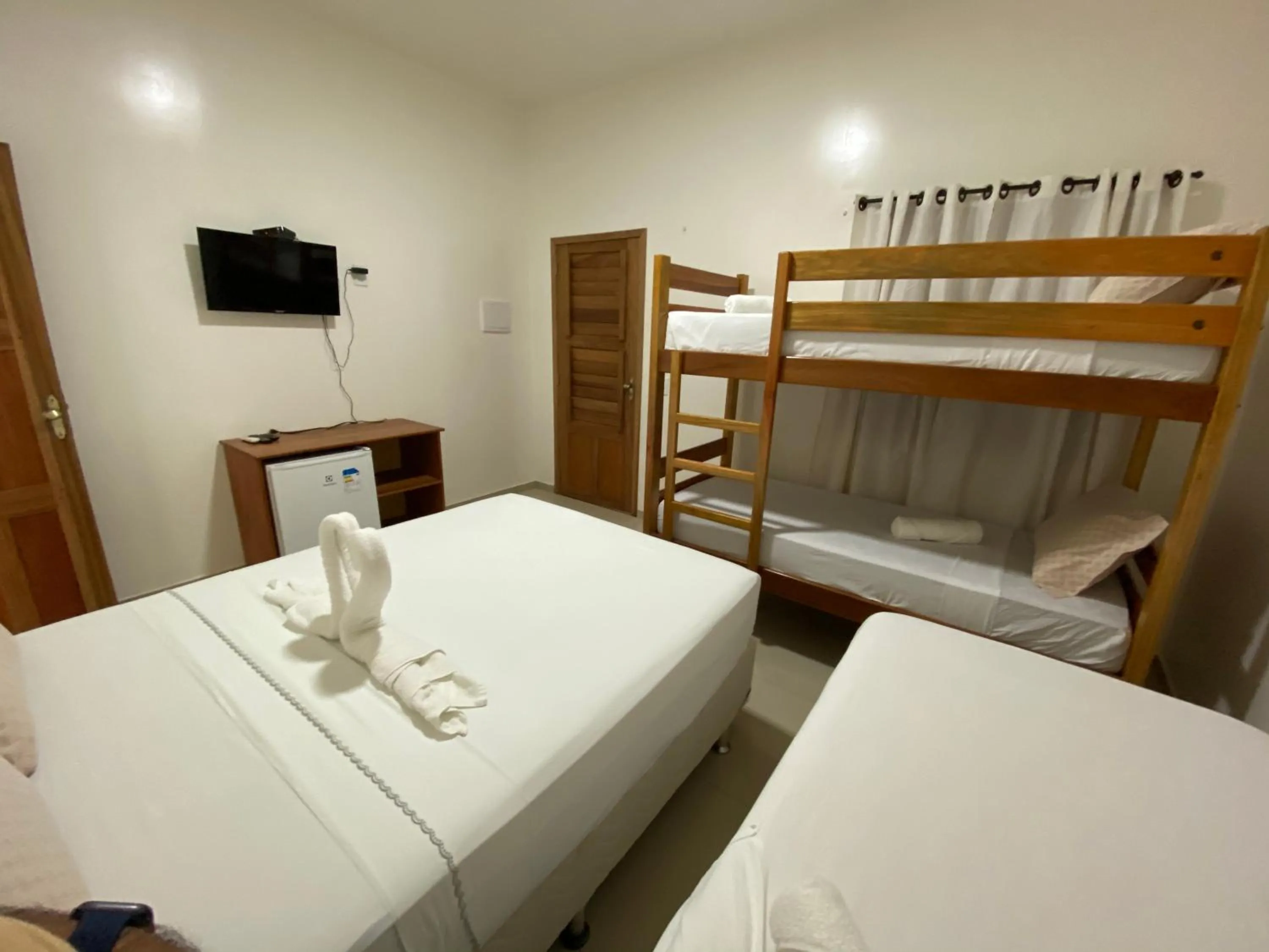 Bed in Pousada Casa da Cion