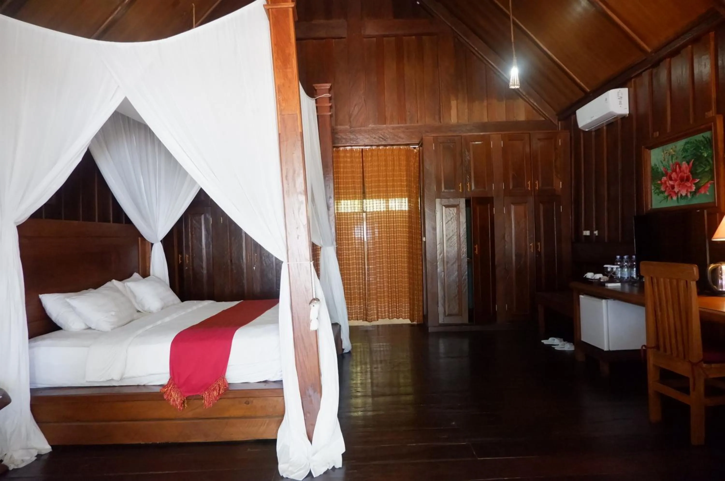 Bed in Wakatobi Patuno Diving and Beach Resort by SAHID