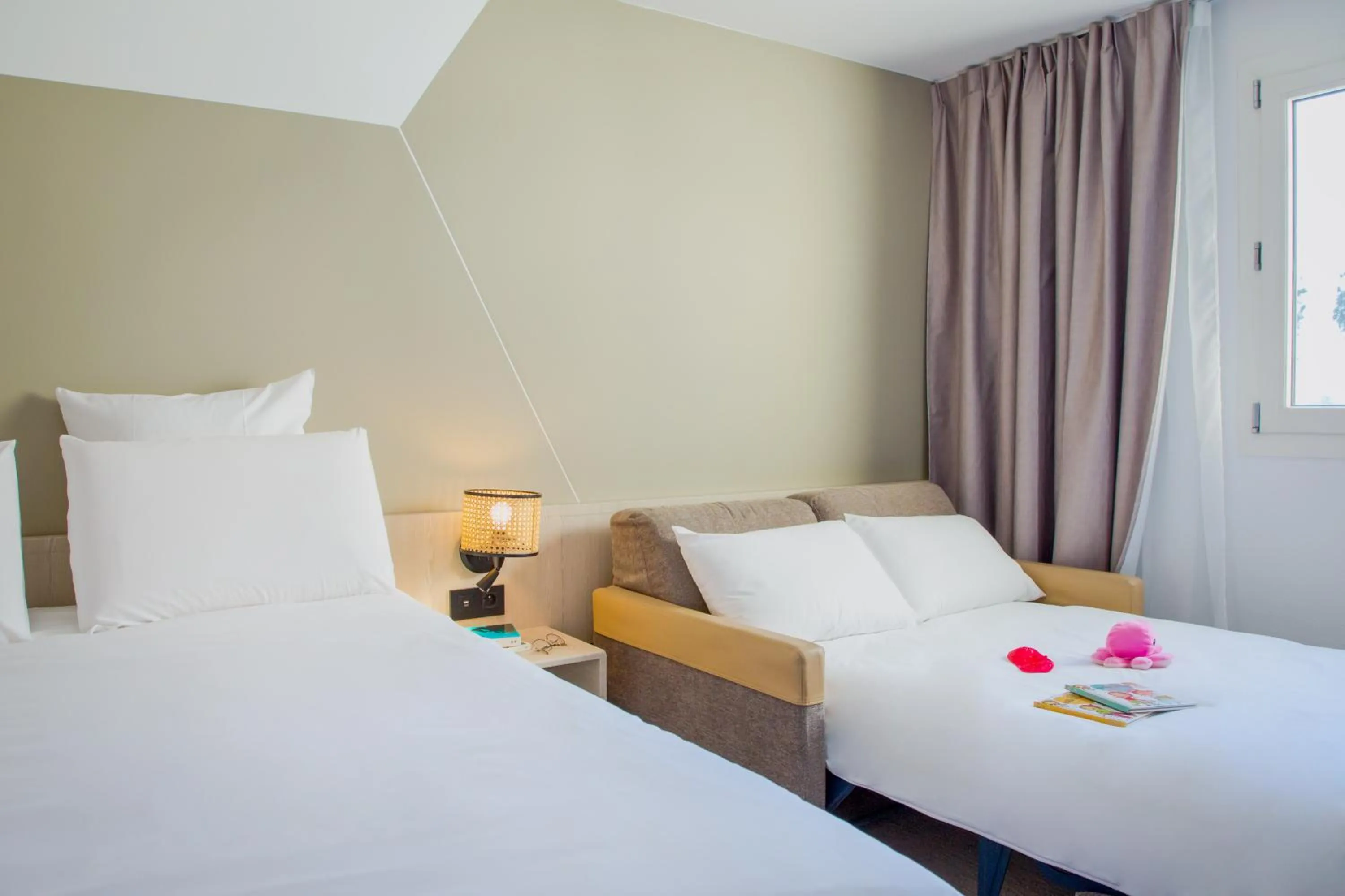 Bed in Mercure Cannes Mandelieu