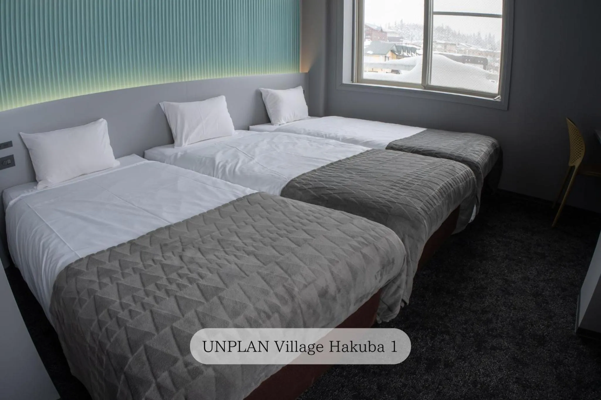 Bed in UNPLAN Village Hakuba