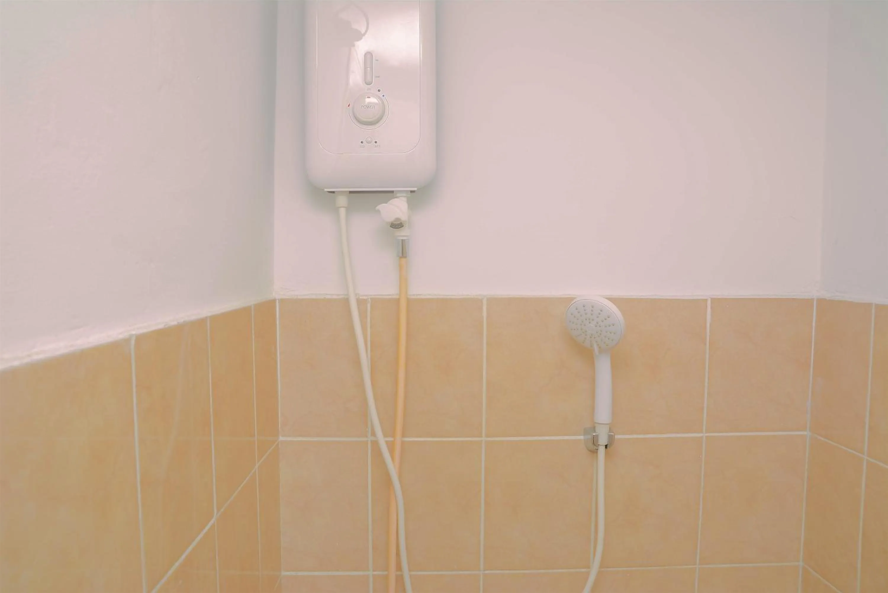 Bathroom in Green Bay Pluit Studio Apartment with 2 Single Beds By Travelio